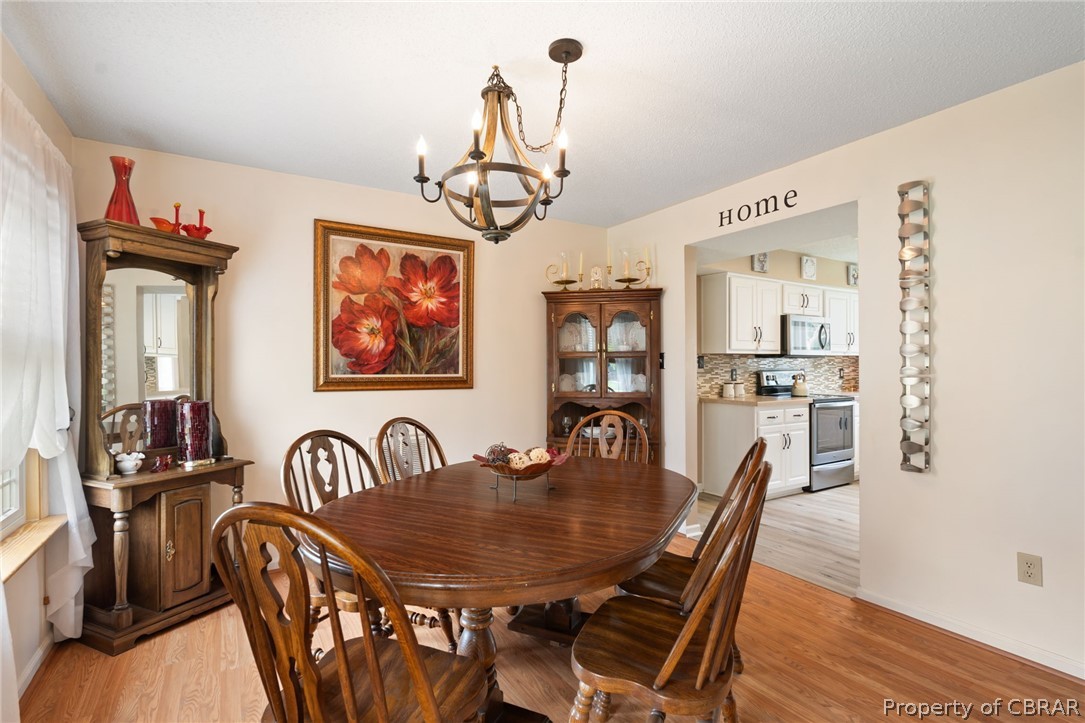 Formal Dining Room with access to kitchen.
