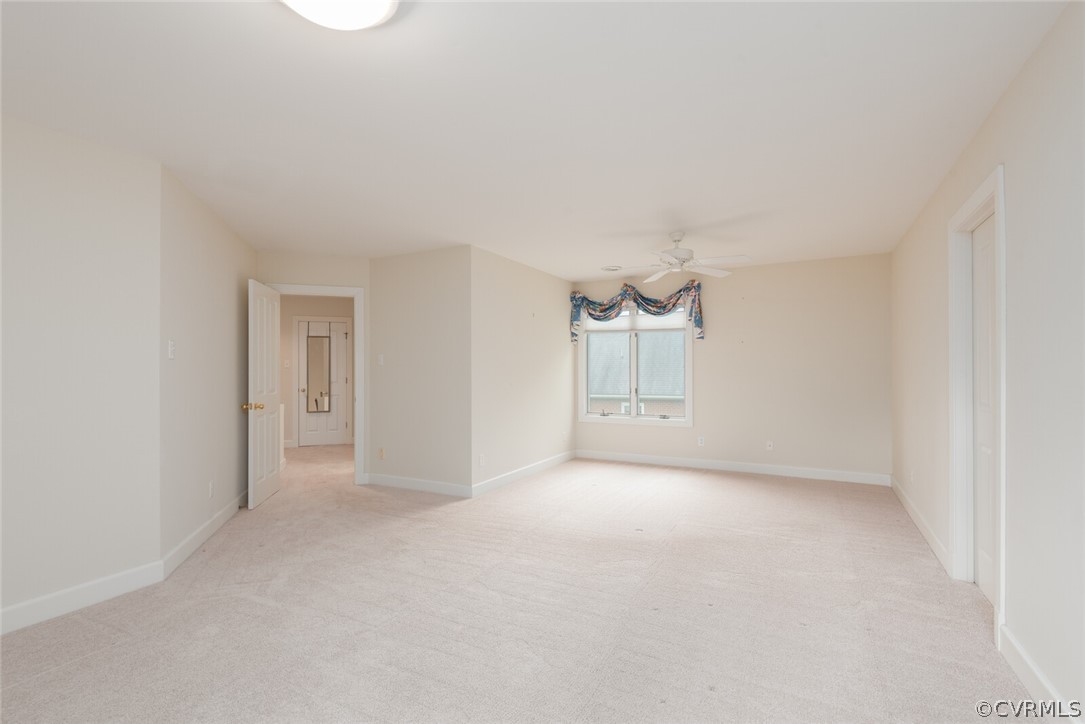 Large 2nd Floor Bedroom with Door to Balcony and Lots of Storage Options