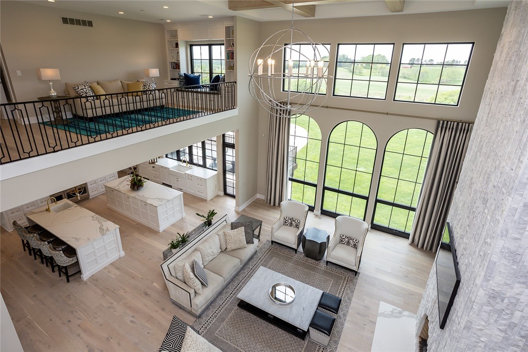 Upper level with catwalk and open railings to a loft area gives a fantastic view to below!