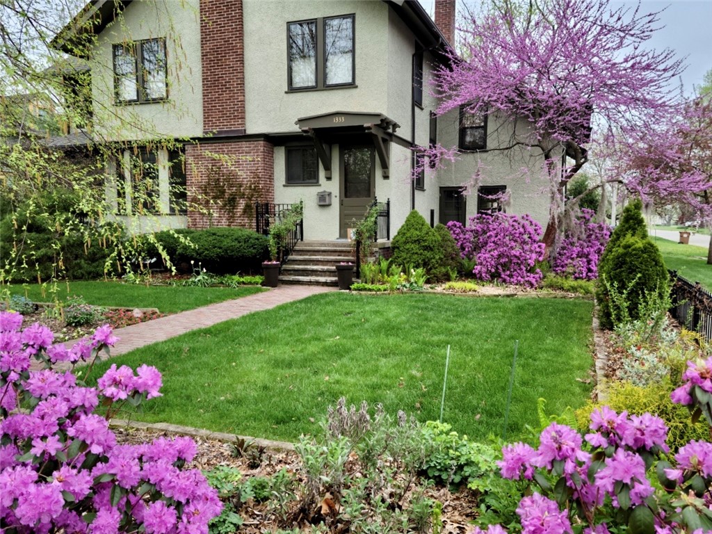 Front of home with spring blooms