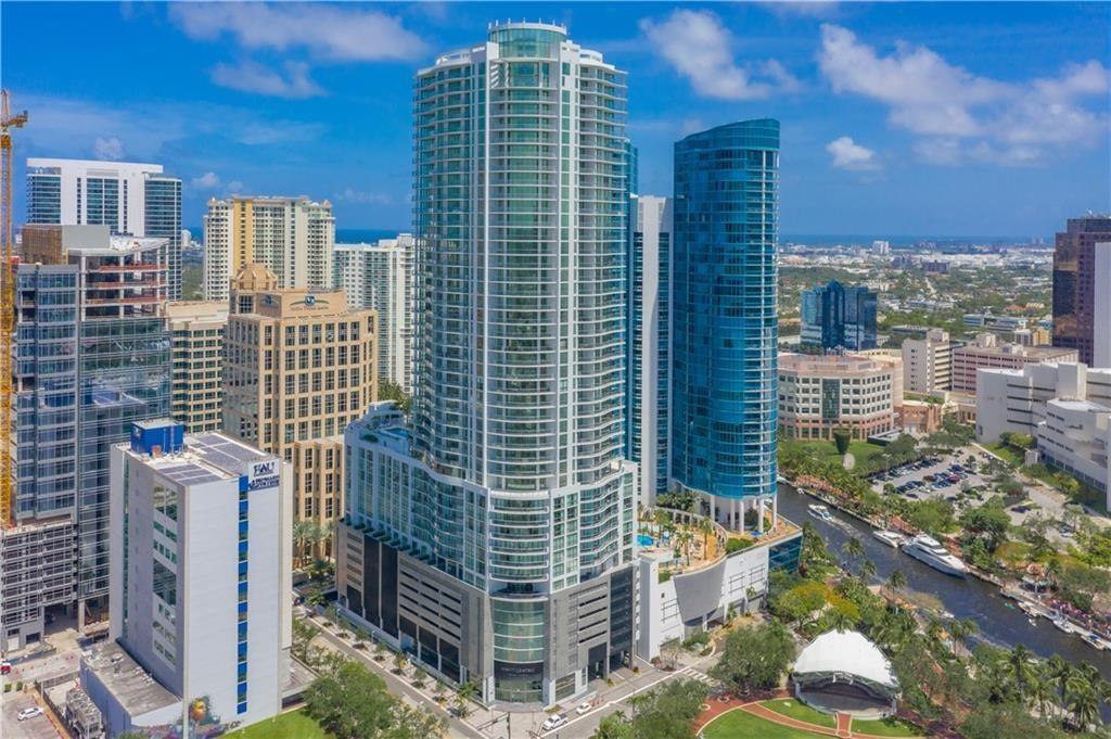 ATTTENTION .....FIRST MONTH IS FREE.....THIS BEAUTIFUL CONDO OFFERS FANTASTIC VIEWS OF THE NEW RIVER AND CITY...2 SPACIOUS SPLIT BEDROOMS PLUS A DEN/OFFICE AND 3 FULL BATHS. MODERN KITCHEN AND BATHS WITH HIGH END FINISHES. LIKE NEW!!!!....COME ENJOY THE  VIBRANT LAS OLAS /FT LAUD LIFESTYLE...EXCELLENT AMENETIES INCLUDE RESORT STYLE POOL, FITNESS ROOM, COMMUNITY ROOM, ON SITE RESTAURANTS, 24 HR SECURITY.
THIS IS THE PLACE TO CALL HOME!!!!! COME FALL IN LOVE WITH THIS BEAUTY..