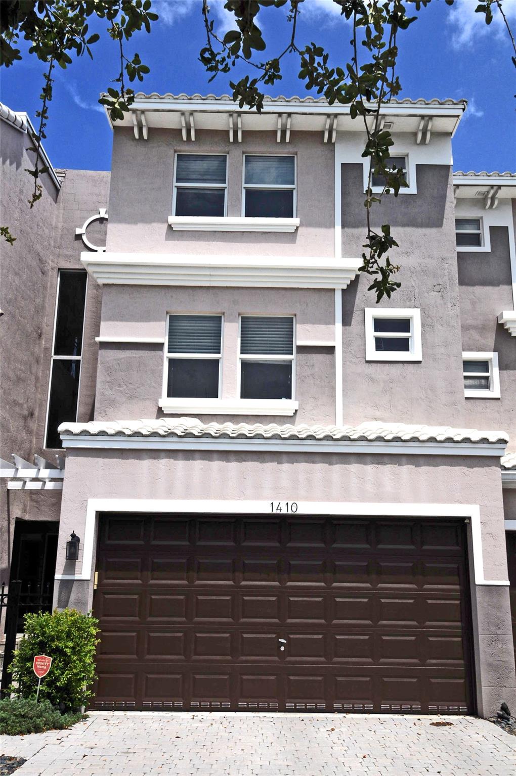 Experience unparalleled luxury in this designer-upgraded, three-story townhouse, blending elegance and comfort in one exceptional location. Just blocks from Galleria Mall and pristine beaches, it offers the perfect mix of tranquility and city living. The interior features rich Wenge wood stairs leading to a spacious loft with office desks, a den, and three luxurious suites, including a master suite with lavish bathroom. The highlight is a private rooftop deck for entertaining under the stars. This home is a testament to sophisticated design, offering a perfect location. Own your slice of paradise, where every detail ensures a life elevated. Come. See. Experience. And make this house-your home. Thank you for your visit.