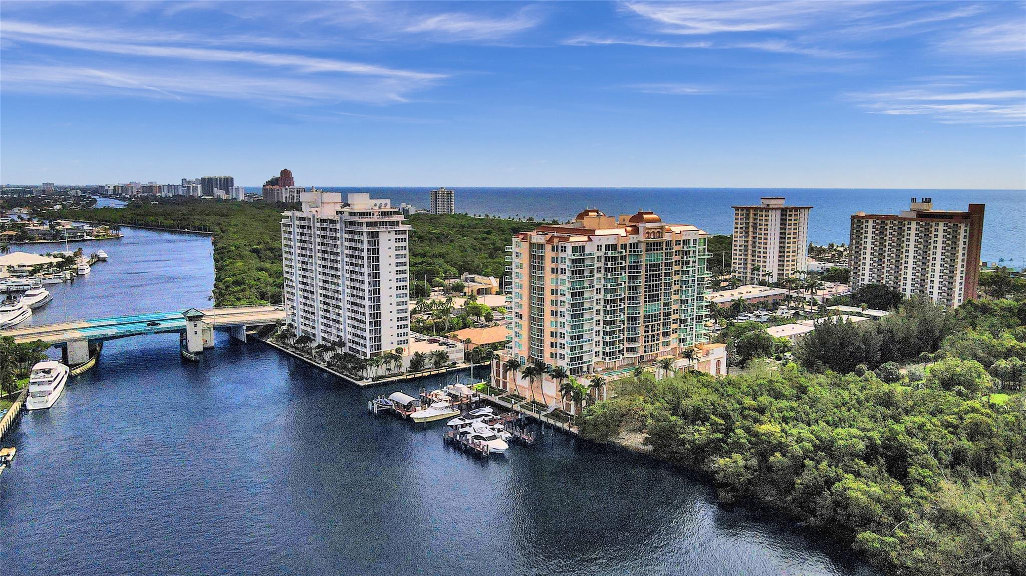 Welcome to Le Club, a luxury boutique condominium of 66 units on the Intracoastal only two blocks to the beach.  This spacious corner unit has 3 bedrooms, 4.5 baths with dramatic views of the Intracoastal, Ocean and Birch State Park from 3 terraces. Enter this 2,630 sqft. unit from the private elevator foyer which opens directly into the unit featuring rich marble floors, floor-to-ceiling impact windows/doors, a generous floorplan including a flow-thru kitchen, laundry room and guest bath. All bedrooms are ensuite, and the Primary features a spa-like retreat of dual baths with intracoastal views. Pet friendly Le Club offers 24-hour security, allows rentals in the first year, dockage as available, a gym, waterfront pool and club room. Unit 804 comes with 2 garage spaces, and extra storage.