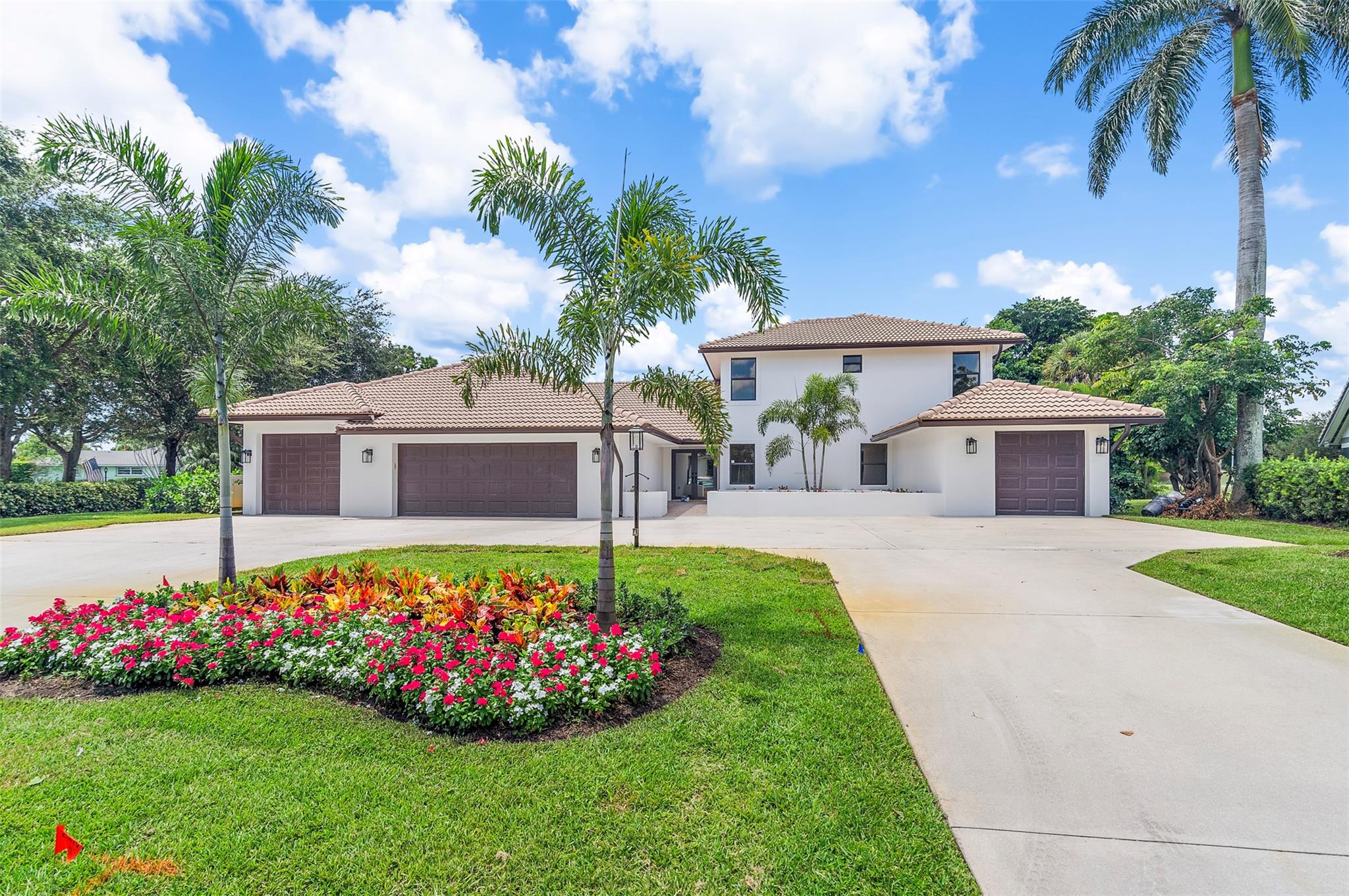 Welcome to your exquisite home in the prestigious Delray Dunes community, a true masterpiece that seamlessly blends modern luxury with timeless elegance. This meticulously renovated residence offers 5 bedrooms, 3 full baths, and 2 half baths, providing ample space for comfortable living and grand entertaining. With a total living area of 4,700 square feet, no detail has been overlooked, showcasing the highest-end finishes and contemporary touches throughout. Delray Dunes is currently undergoing a renovation of it's Pete Dye Golf Course by Scot Sherman. Mr. Sherman's work includes the Ocean Course at Kiawah and Atlantic Dunes at The Sea Pines Resort in Hilton Head. Expected completion is Fall of 2024. The heart of this home is its stunning kitchen, equipped with a Sub-Zero refrigerator, a Wolf gas stove, a dedicated appliance garage, and a large center island, making it perfect for culinary enthusiasts and gatherings. The owner's suite is a sanctuary, featuring a spacious bedroom, a magnificent bathroom with a walk-in shower and bathtub, and a large custom-built closet for ample storage. This home is designed for entertainment, with a custom-built bar in the back room and a completely updated movie theater that boasts a 96-inch TV, custom-built staged seating, and surround sound for an immersive experience. The home is equipped with 4 WiFi 6 access devices providing ample coverage throughout the entire home. 

Two additional bedrooms are located downstairs, while two more bedrooms upstairs are accompanied by a large loft area that opens onto a spacious patio deck offering a breathtaking 180-degree view of the spectacular 12th hole. The large screened pool area is perfect for outdoor entertainment, complete with an outdoor BBQ area and a covered porch, allowing you to enjoy the serene views and the Florida lifestyle in this exquisite setting. The home also features a 3-car garage and a separate 1-car golf cart garage, all accessible via a circular driveway, providing convenience and ample parking.

This home is equipped with 4 new Trane AC units for optimal climate control, impact windows and doors for security and energy efficiency, and custom pre-engineered wood floors that add warmth and elegance to the living spaces. Additionally, two laundry rooms, one upstairs and one downstairs, offer convenience and functionality. This residence is a rare gem, combining luxury, comfort, and modern amenities in a prime location. Don’t miss the opportunity to own this stunning home in Delray Dunes. Contact us today to schedule a private tour and experience the epitome of refined living.