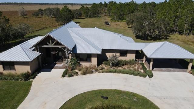 This amazing commercial hunting ranch located in Venus,fl Is one of a kind, with approximately 1300 acres of high fence, 1400 acres total, boasting some of the most spectacular whitetail deer in the country, along with axis and blackbucks, also used to conduct some of the finest wing shooting any where ! Situated on the property are multiple structures, including a one of a kind lightered and cypress 10 bedroom lodge, and a 3 bed 4 bath custom home. This turnkey ranch has a substantial income, and can either be operated as it has been for 7 years or just a private playground, either way it is a must see for anyone interested in a Florida property!