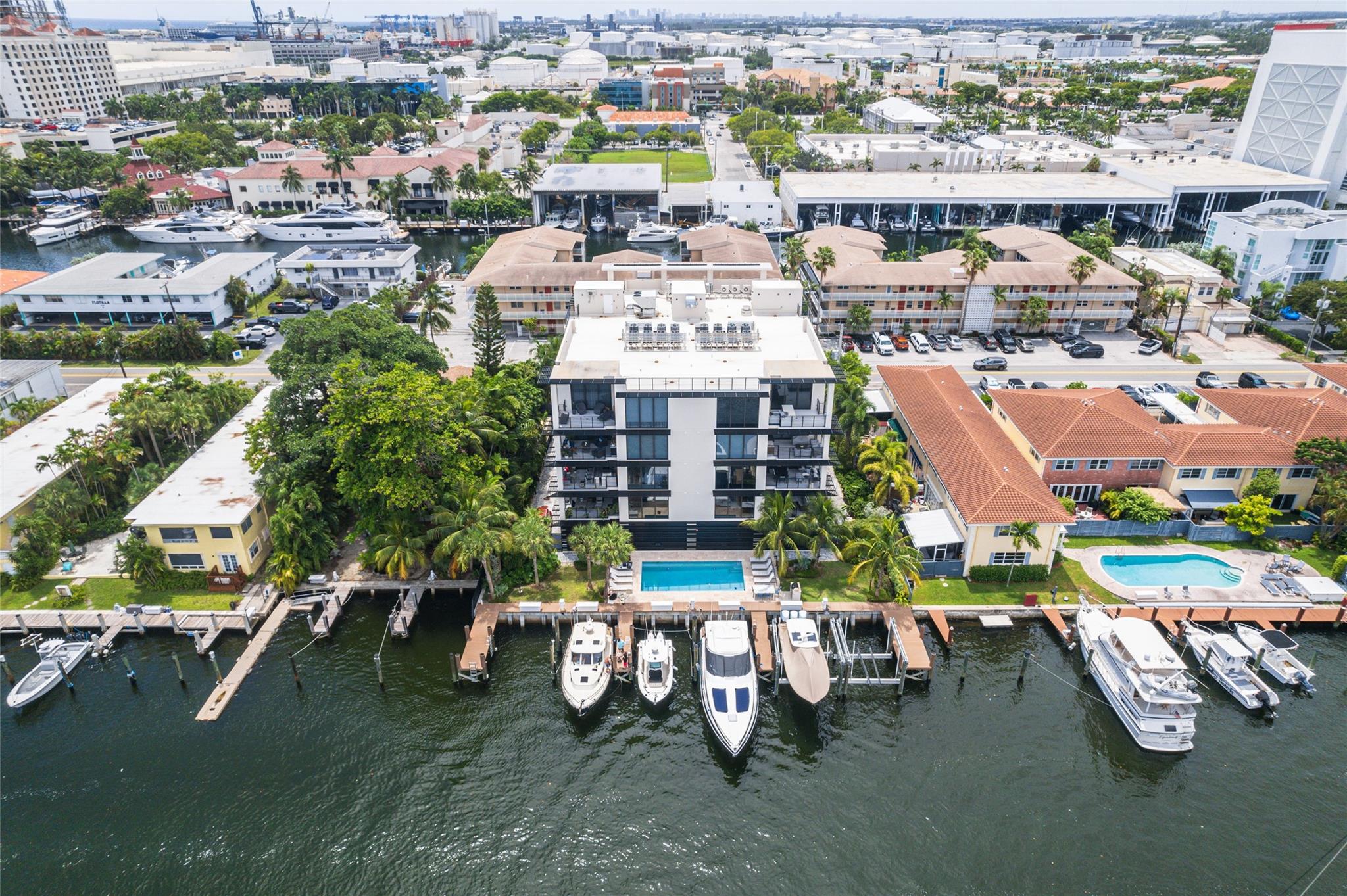 Harbors Edge - Newly Built 2022 - 3BD |3BA | Sq Ft 2,372 Stunning boutique community in the heart of Fort Lauderdale’s elite yachting community. Gorgeous corner unit professionally decorated and furnished by one of the areas top interior designers w/ large private waterfront terrace. Enjoy exquisite sunsets and spectacular city views. Floor to ceiling UV impact glass. High end fixtures, chefs kitchen w/Thermador, Fisher Paykel appliances, spacious living & dining area w/ impressive views, walk-in closets, walk-in pantry, enthusiast wine tower, and fabulous bedroom views. Custom glass interior wall w/ barn door, new built- ins for office, storage. Building is equipped w/emergency generator, 2 assigned garage parking spots. Minutes from, beaches, FLL airport, restaurants, Las Olas & Downtown