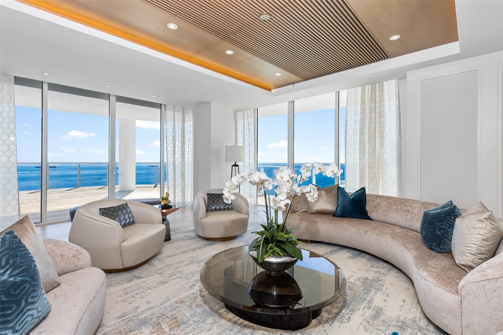 Indulge in the pinnacle of coastal luxury with this extraordinary two-story Grand Penthouse at the exclusive, new Four Seasons Fort Lauderdale Beach Residences. Elegantly curated interior design by renowned Michael Beamish is framed by breathtaking panoramic ocean views. The penthouse is designed for the most discerning, w/ floor-to-ceiling windows, expansive terraces, & a private upper-level terrace perfect for lavish entertaining or relaxation. The gourmet kitchen is a chef’s dream, featuring top-of-the-line appliances and custom cabinetry. The primary suite is a haven of tranquility, offering a spa-inspired bath and a spacious walk-in closet. Residents enjoy access to world-class FS amenities, including a full-service spa, infinity-edge pool, fine dining, and 24/7 concierge services.