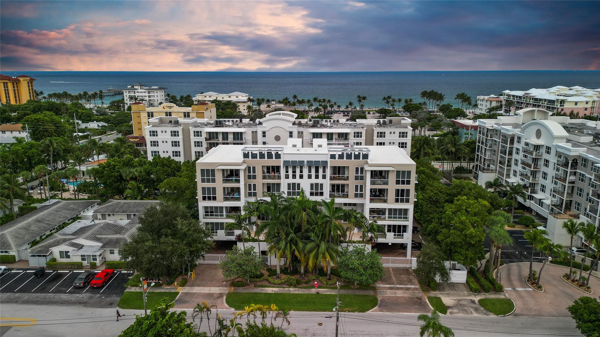 Experience the ultimate in luxury at The Hemingway condominium, where sophisticated design and elite amenities converge. Ideally situated in Deerfield Beach, just steps from the ocean, this magnificent corner unit boasts 10” ceilings, expansive Intracoastal and pool views from two balconies, secure parking for two vehicles, marble floors, impact windows, chef-inspired kitchen, and two generously sized bedrooms each with an en-suite bathroom and additional half bath for guests. Uniquely, this building allows AirBNB. Enhanced by recent roof replacements and new carpeting, its prime, gated location offers stroll-to-beach convenience and proximity to downtown Boca Raton. Only building in the area that allows daily, seasonal, weekly & monthly rentals, Easy to rent, pets ok, Investor friendly. Experience the ultimate in luxury at The Hemingway condominium, where sophisticated design and elite amenities converge. Ideally situated in Deerfield Beach, just steps from the ocean, this magnificent corner unit boasts 10” ceilings, expansive Intracoastal and pool views from two balconies, secure parking for two vehicles, marble floors, impact windows, chef-inspired kitchen, and two generously sized bedrooms each with an en-suite bathroom and additional half bath for guests. Uniquely, this building allows AirBNB. Enhanced by recent roof replacements and new carpeting, its prime, gated location offers stroll-to-beach convenience and proximity to downtown Boca Raton. Only building in the area that allows daily, seasonal, weekly & monthly rentals, Easy to rent, pets ok, Investor friendly.