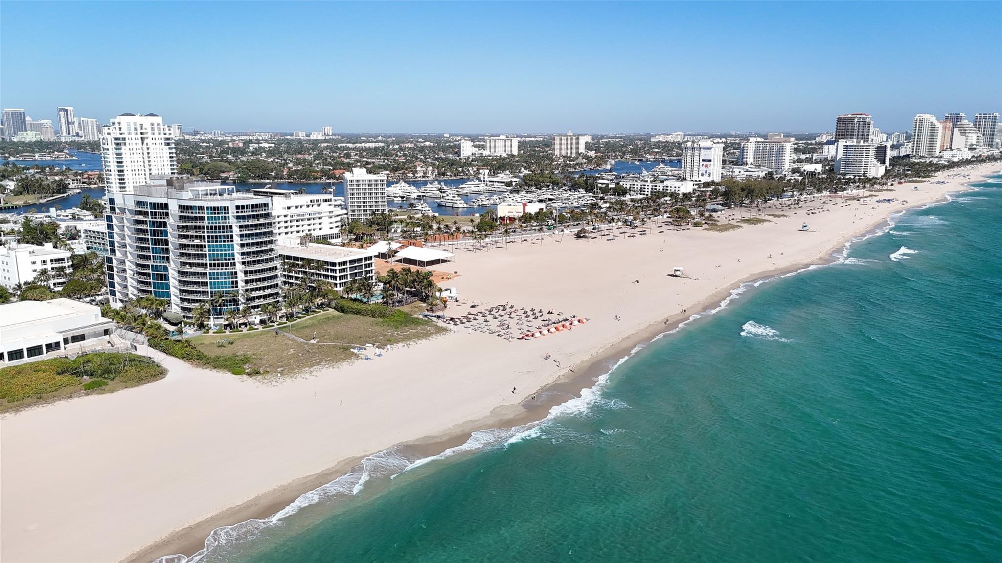 Direct oceanfront in one of Fort Lauderdale’s newest luxury developments directly on the sand w/ one of Fort Lauderdale few private deeded beaches, reserved only for residents. The condo is wrapped w/ floor-to-ceiling windows inviting natural light throughout, direct oceanfront master bedroom views, endless terraces totaling 75' and Snaidero Italian kitchen cabinetry. 2021 AC. 90’ heated pool w/ sun exposure from sunrise to sunset. Other amenities include 24 hour valet parking, fitness center, club room/theater, spa & 24/7 security. Adjacent to Sea Level, Ocean 3030, Starbucks and other restaurants. Special rates for adjacent resort beach club membership which includes tennis, spa, local golf privileges & other services. Live in luxury directly on the ocean in new building at great value!