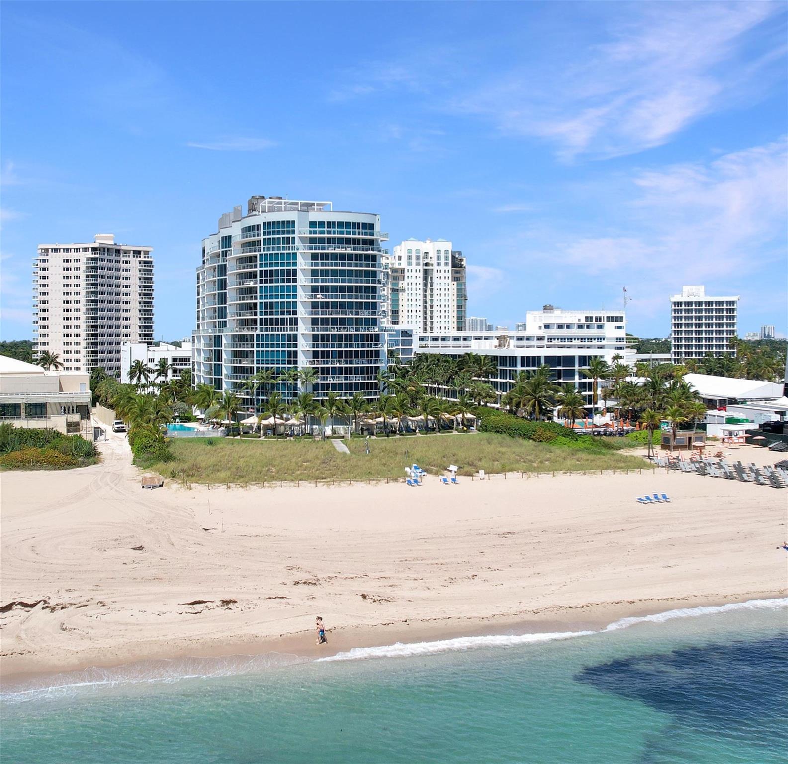 Direct oceanfront in one of Fort Lauderdale’s newest luxury developments directly on the sand w/ one of Fort Lauderdale few private deeded beaches, reserved only for residents. The condo is wrapped w/ floor-to-ceiling windows inviting natural light throughout, direct oceanfront master bedroom views, endless terraces totaling 75' and Snaidero Italian kitchen cabinetry. 90’ heated pool w/ sun exposure from sunrise to sunset. Other amenities include 24 hour valet parking, fitness center, club room/theater, spa & 24/7 security. Adjacent to Sea Level, Ocean 3030, Starbucks and other restaurants. Special rates for adjacent resort beach club membership which includes tennis, spa, local golf privileges & other services. Live in luxury directly on the ocean in new building at great value!