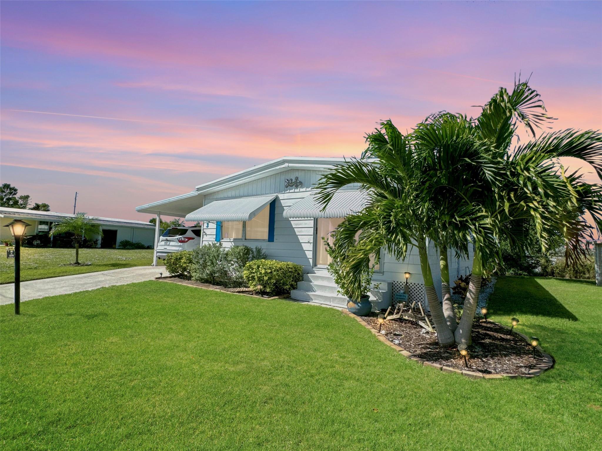 Explore this delightful and spacious 2-bedroom, 2-bathroom mobile home in the sought-after 55+ community of Pinelake Village in Jensen Beach. The master bedroom offers a roomy walk-in closet, providing ample storage. Unwind in the bright sunroom, with convenient access to the washer and dryer in the nearby utility room. Partially furnished and move-in ready, this home is attractively priced and combines comfort with convenience. Pinelake Village offers an active lifestyle with a community clubhouse, gym, pool, jacuzzi, shuffleboard, library, and billiards room, along with a year-round calendar of events. Lot rent is just $724/month—schedule your visit today and enjoy all that this vibrant community has to offer!