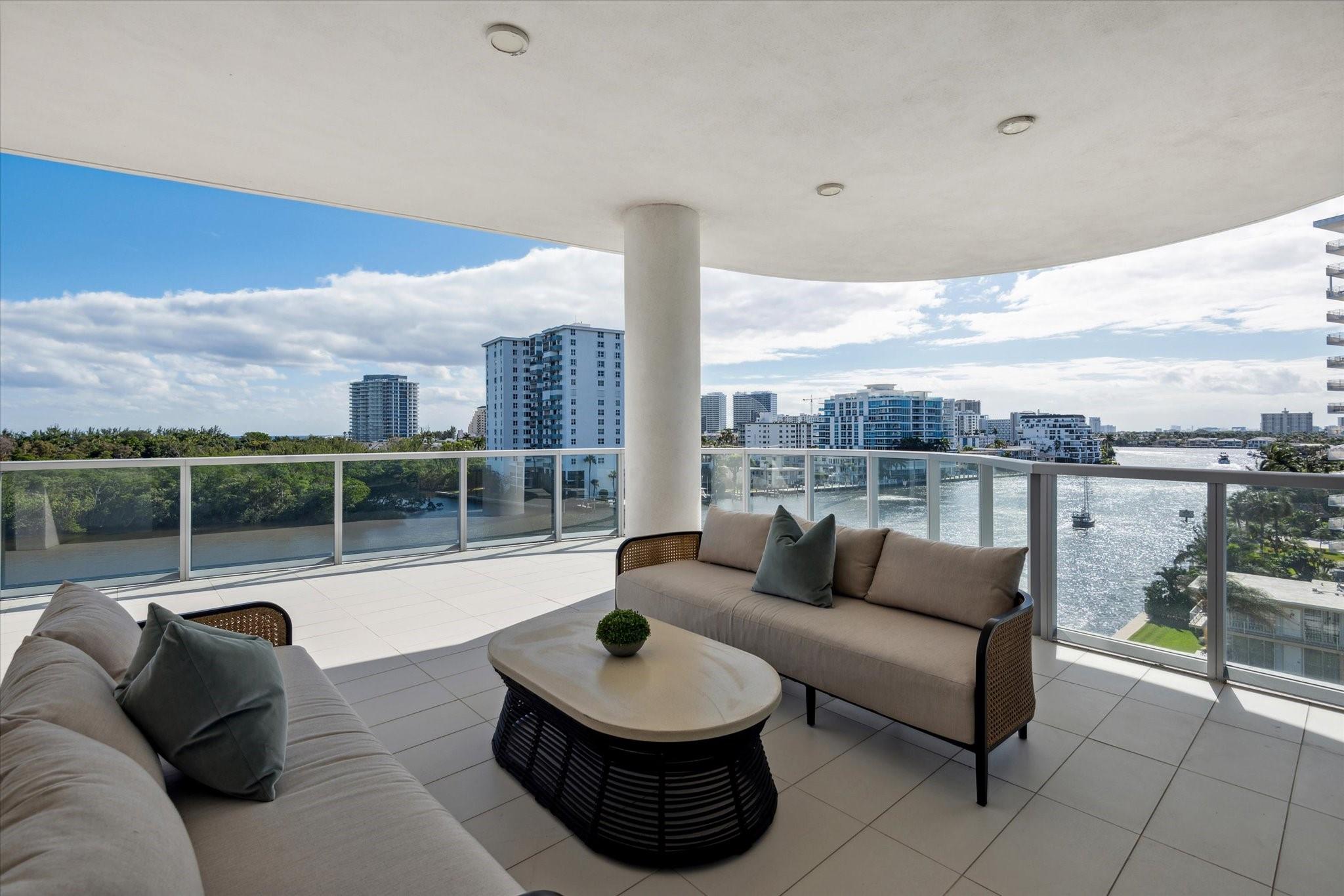 Located directly on the Intracoastal Waterway, Aquablu consists of 35 luxury residences. This flow-through SE corner unit offers sweeping views of the water/historic Bonnet House/City skyline from the impressive balconies. Private double door foyer entry opens to a great room with 10' ceilings & glass walls, highlighting the views & bathing the space in natural light. Professionally designed touches abound in the open-concept living/ dining spaces. The chef's kitchen boasts high-end appliances with a massive island, walk-in pantry, & immense counter space. Wake up to amazing sunrises from the Primary suite, which overlooks the water with a spa bath & 2 large walk-in closets. 2 additional en-suite bedrooms & two assigned covered parking spaces are located near beaches, shopping, & dining.