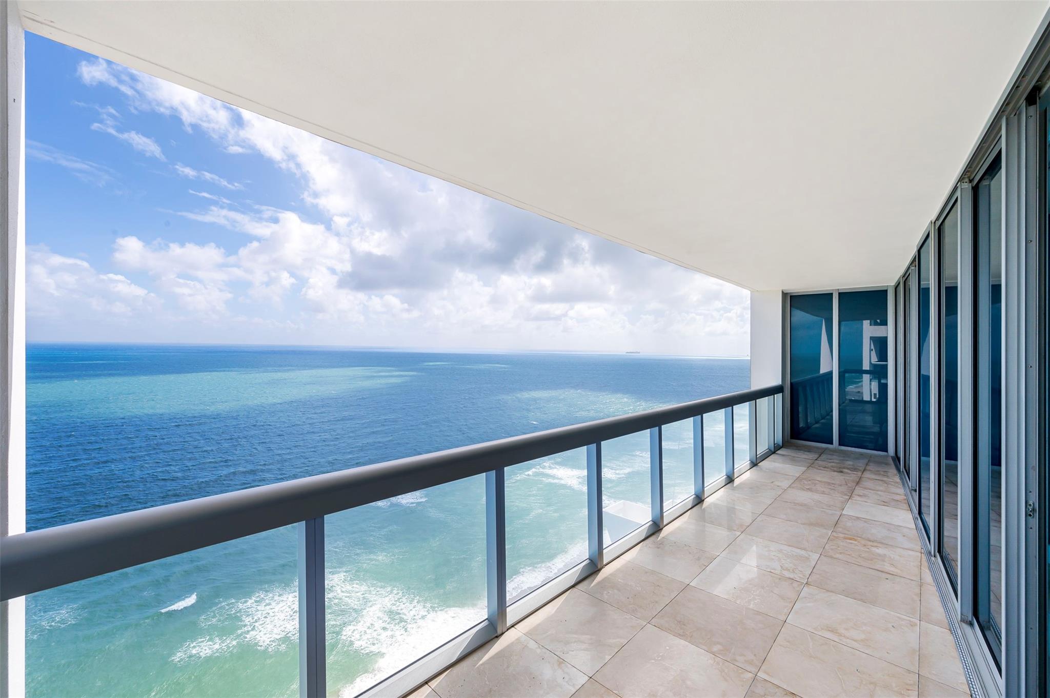 Breathtaking ocean & bay view residence in the exquisite North Tower at Carillon Miami Wellness Resort. Stunning condo offers expansive floor-to-ceiling windows with panoramic views of the Atlantic Ocean and Biscayne Bay, with abundant natural light, sunset & sunrise views. Open-concept features a gourmet kitchen with sleek cabinetry, large island and dining room perfect for entertaining. Primary suite has luxurious ensuite bathroom w soaking tub, glass-enclosed shower, & walk-in closet. One of a kind unit features windows on 3 sides, 2 bedrooms with den, 2 large terraces & laundry room. World-class amenities, include private beach club, 4 pools, fitness center, full-service spa, restaurant and coffee shop. All Information based on Miami Dade Property Appraiser Website for Buyer to verify. All information and measurements based on Miami Dade Property Appraiser website.