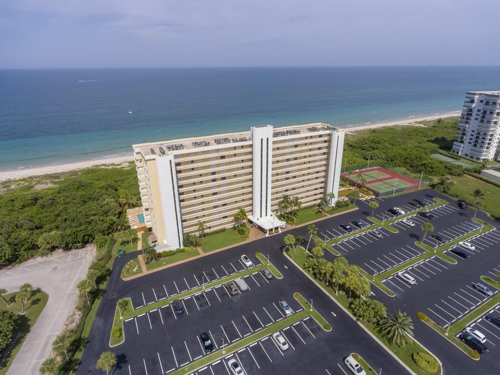 WOW! What a value for this outstanding 2br/2ba 6th-floor corner condo on the Atlantic! The views are spectacular! Look north up the beach for miles past the Navy Seal Museum, enjoy unobstructed direct ocean views with incredible sunrises, & see life on the intracoastal from your front door. Listen to the waves while having coffee on your wrap-around balcony or enjoying a good book from your sofa. This home has been tastefully updated & being sold turn-key. Updates include tile thru-out, granite counters, new lighting, & newer A/C & hot water heater (2021), new hurricane shutters. Walk out the building to private beach access & unspoiled beaches. Amenities include pool, club room, pickleball/tennis, & shuffle board. Wonderful community in fantastic location between Vero Beach and Ft Pierce!