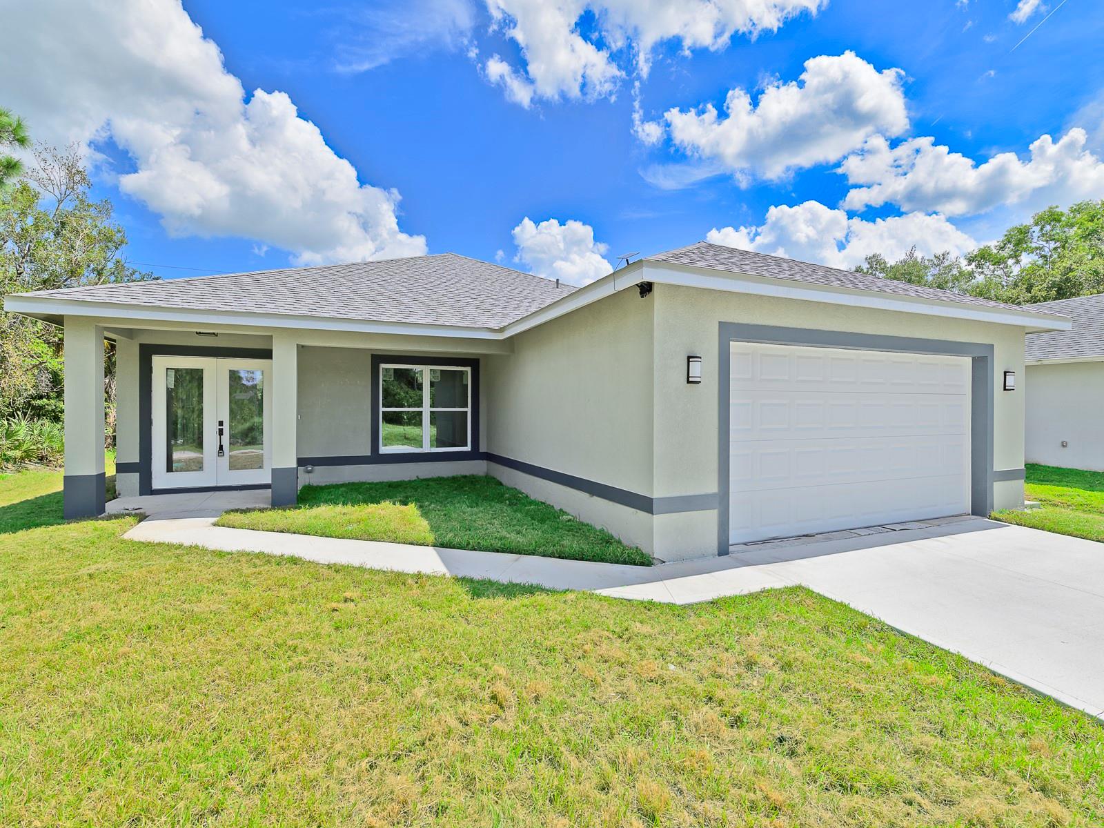 EXCELLENT OPPORTUNITY TO OWN A BRAND-NEW HOME IN VERO LAKE ESTATES! This spacious home boasts an oversized floor plan of 2,040 sq. ft. offering more room than the standard layout. It features 3 bedrooms, 2 baths, open design with vaulted ceilings, large great room, and modern kitchen equipped with 42" wooden cabinets, quartz countertops w/ full backsplash, and a large island ideal for meal prep/entertaining. Designed with hurricane impact windows and doors, 24"x48" porcelain tile flooring throughout, top-of-the-line stainless steel appliances, and full size washer & dryer.  Additional highlights include a 2 car garage, security cameras & 7 yr builder warranty. No HOA. Enjoy a quiet country atmosphere while being minutes from the beach, expressways, and all the convenience of city living.