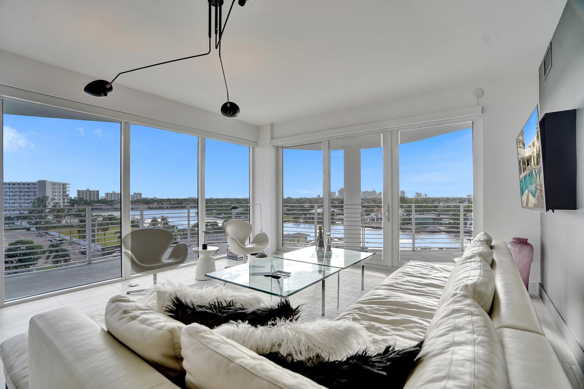 Step into coastal luxury with this modern 3 Bed, 2.5 bath condo. Nestled Just 3 blocks from the beach and along the intracoastal The Wave on Bayshore sits favorably among it's locals -The Four Seasons, The Conrad & The Ritz Carlton. Enjoy your 180 degree wrap around 1,000 sq. ft. terrace with stunning views of the intracoastal, ocean and downtown Ft. Lauderdale. With floor-to-ceiling impact window throughout, this unit offers a spacious open floor plan flooded with natural light. Total of 3,105 sq. ft indoor/outdoor space.
Kitchen has European Design Cabinetry, Quartz Counters & Bosch appliances. Wake up to water views in every bedroom! Residents enjoy access to a resort-style heated pool, outdoor dining & lounge area, outdoor barbecue grill, fitness center and concierge services.