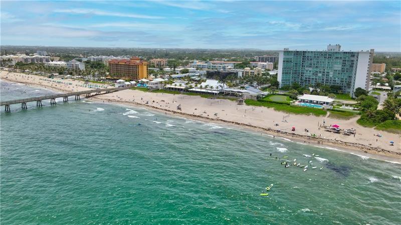 AT THE BEACH! Direct Oceanfront condo everywhere you look. 3 bedroom converted to 2 bedroom 2 1/2 bath split Floorplan. Floor to ceiling Hurricane Impact windows throughout. Open floorplan to create expansive living area. Beautiful flooring throughout. LONG 50+ ft balcony from all living areas. WALK to JBs & Oceans 234! Party at the newly renovated cabana & BBQ area. As an owner, enjoy all that the Tiara East Cabana Beach Club has to offer- Salt water Pool, golf putting green, Shuffle Board, 24 hr. concierge, Gym on-site. Steps away from the 976 ft Deerfield Beach International Fishing Pier. Walking distance to everything!