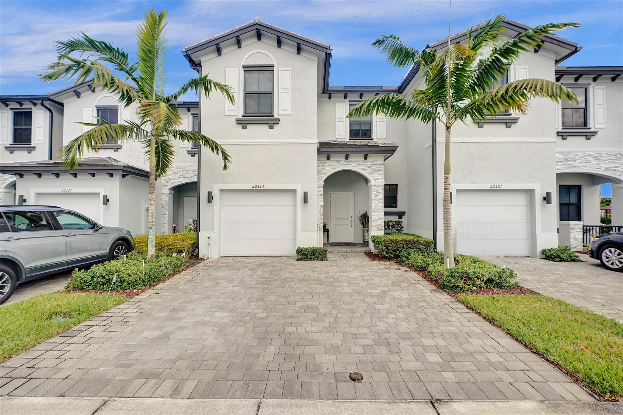 This newer construction townhouse has a harmonious blend of modern luxury upgrades. 1740 SqFt of living area boasts 3 spacious bedrooms, 2.5 bathrooms, 1 car garage and space for 2 additional cars on its brick paved driveway. Open floor-plan, designer wood wall panels in the living room and Island. Kitchen granite countertops, soft close modern cabinets, large Porcelain Tile throughout first floor with high-end baseboard. Luxury soft vinyl flooring up stairway and throughout second floor, Custom Electric Blinds in all windows & sliding doors downstairs. All bedrooms have built-in  closets systems and more..

r