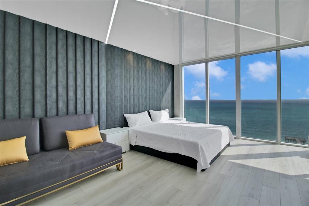 Directly on the Beach!
Wake up to stunning ocean views from your bed in this newly renovated, uniquely designed 2-bedroom, 2-bath apartment on the 20th floor. This spacious, light-filled unit features modern appliances, a wraparound balcony, and stylish furnishings.

Included in rent:
Water, cable, and full beach service
24/7 valet parking and security
Access to a full-service building

Conveniently located within walking distance of the Sunny Isles pier, restaurants, and street malls.
Available for immediate occupancy.
Price listed is for a one-year lease.
Shorter terms available (minimum 6 months).
Don't miss this opportunity!