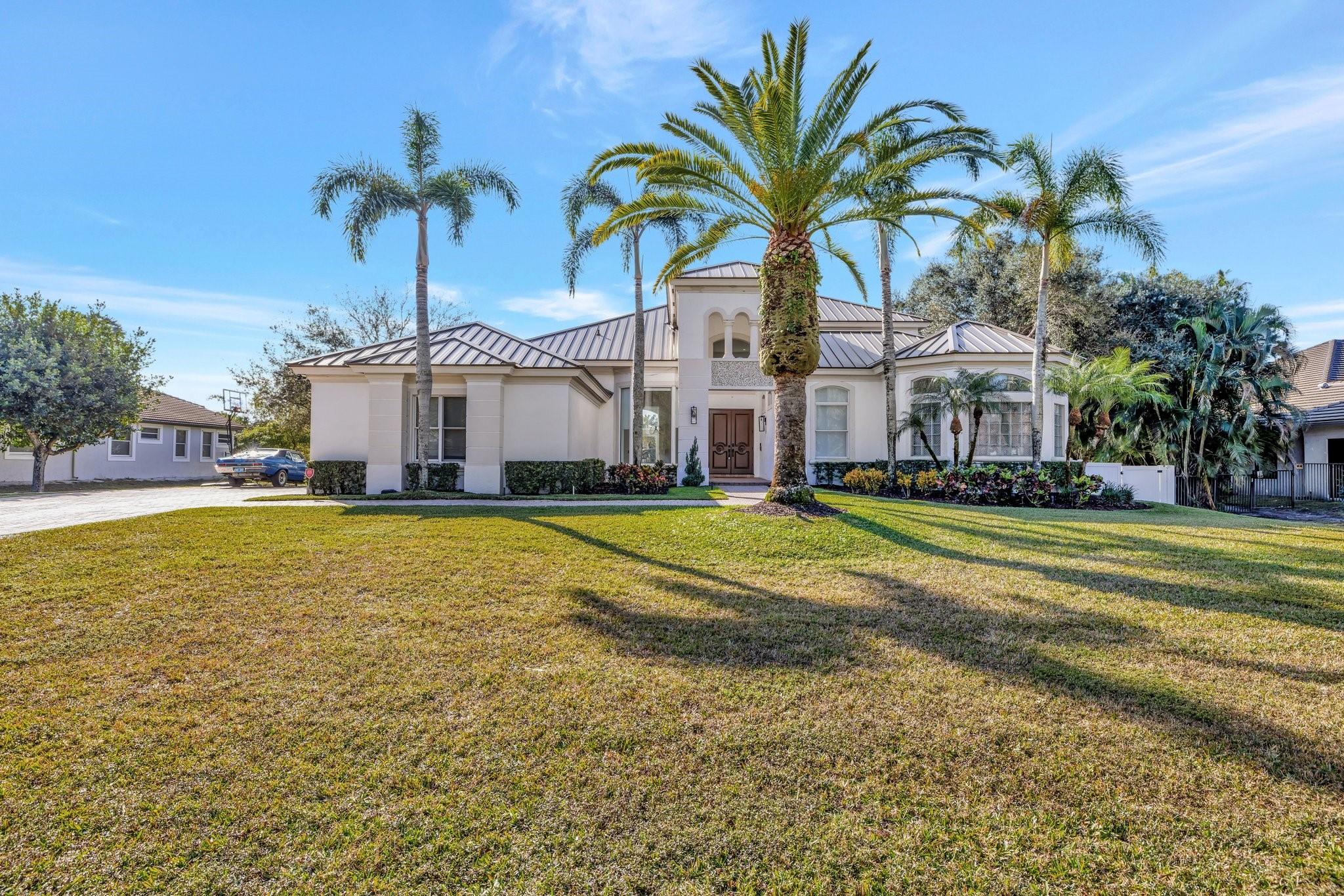 Stunning and spacious house for sale in Plantation Acres! This exceptional property features a brand new metal roof and a luxurious kitchen designed for modern living. The open floor plan seamlessly connects the living spaces, offering four generous bedrooms plus an office, along with an additional loft area upstairs. As you enter, you'll be captivated by the beautifully designed upscale heated pool, perfect for relaxation and entertaining. The property is enclosed by a PVC fence, ensuring privacy for your family and gatherings on a builders acre. With high ceilings throughout, this home provides an airy and inviting atmosphere. Don’t miss the opportunity to make this dream home yours! NO HOA!