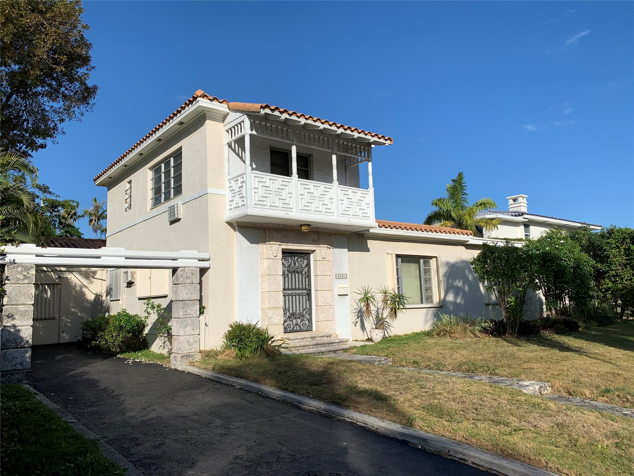 LOCATION! Rare opportunity to own on Flamingo Drive. Charming Mediterranean home, prestigious quiet, residential neighborhood few minutes’ walk to shops, restaurants, house of worship & beach. This 4 bedroom and 4 bath, plus an air-conditioned converted garage offers an additional 5th bedroom option. The main floor consists of a Florida room with fireplace, living room & den plus primary bedroom with ensuite. The second floor has two more large bedrooms with ensuites, one with balcony. There is an additional In-laws ensuite connected to the main house. The backyard has room for entertaining and ample space for a pool. This home features original wood beam ceilings, decorative Spanish tile, mahogany flooring on the second floor and cedar lined closets.