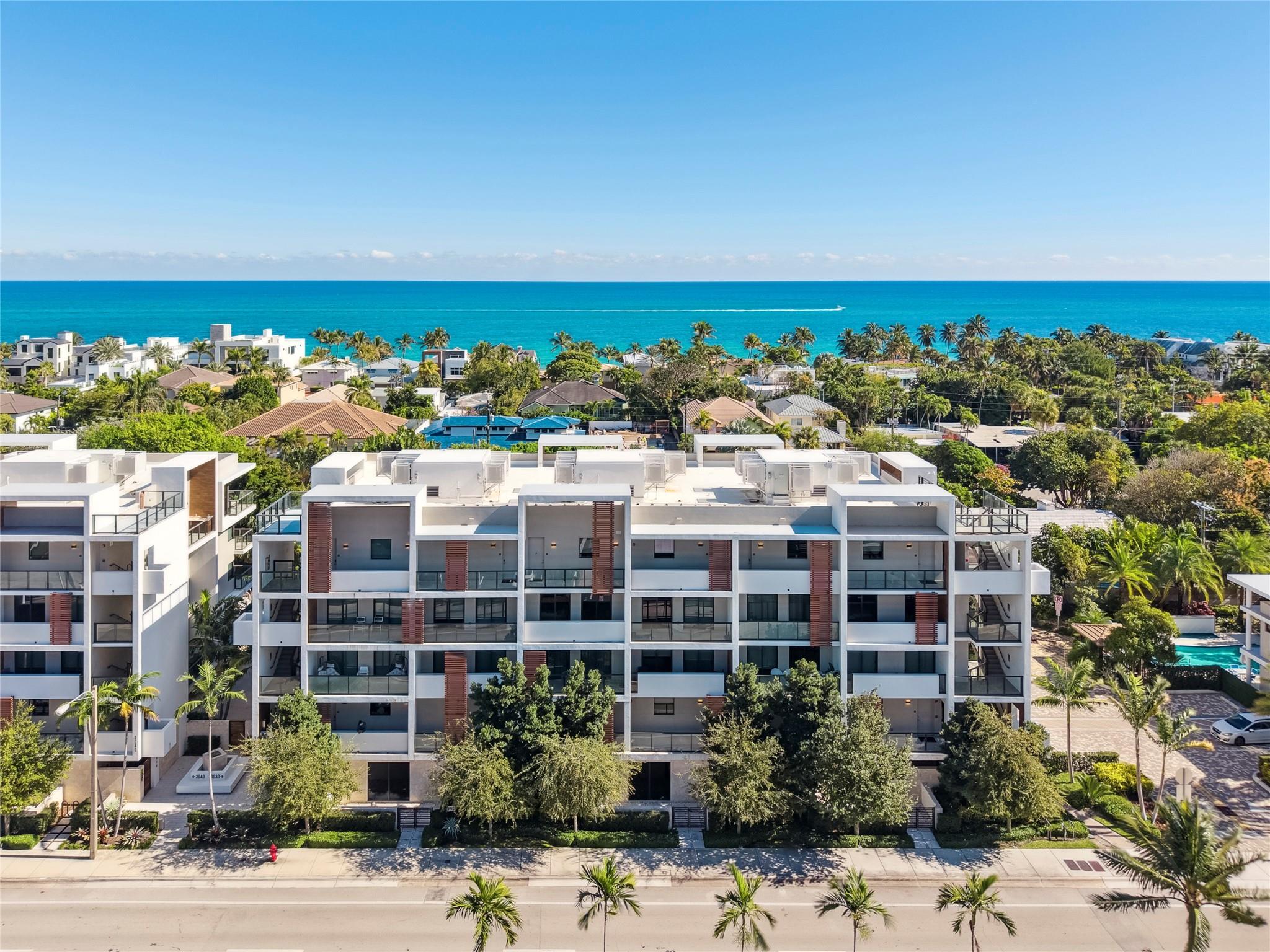 Just steps from Fort Lauderdale Beach, this two-level, pet-friendly condominium offers the privacy of a home with the ease of low-maintenance living. A rare northeast corner exposure fills the home with natural light, while the oversized balcony (one of four!), features a summer kitchen with electric grill - perfect for entertaining. Inside, three spacious bedrooms and an open-concept living area provide both comfort and style. Enjoy top-tier amenities, including a sparkling pool, well-equipped fitness center, and private gated parking for two cars. The building’s modern design, completed in 2020, ensures both elegance and efficiency. All within walking distance of the beach, dining, shopping, and vibrant nightlife, this is the ultimate coastal retreat. Priced to sell!