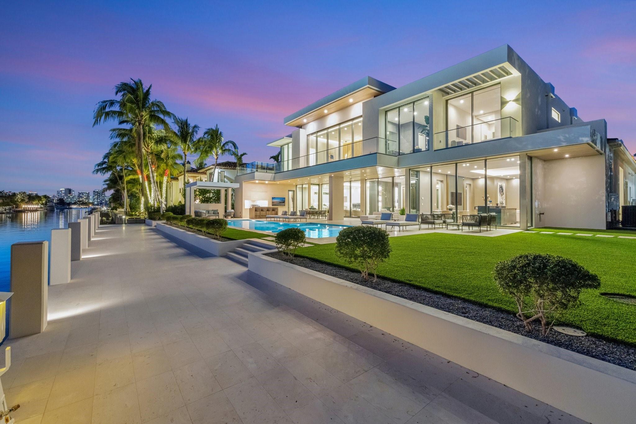 One of the newest Estates to be completed in guard-house gated & private Surf Club, Harbor Beach ! 110 ft deep-water dockage, open panoramic views on wide turning basin & premier Del Lago address. Stunning Coastal Modern collaboration by Randall Stofft/Sarkela Corp/professional interior design & furnished by Italian D-Editors. Built to highest custom standards with extraordinary detailing & materials throughout. Floorplan focus on open concept living, Chef's kitchen & separate prep/caterers kitchen, expansive club/media room, elegant formal dining area & first level VIP suite. Ultra-luxurious primary suite with dual spa-style baths & separate completed custom closets. Spacious bedrooms & second VIP suite, incredible views from many rooms, private resort style pool. Lift compatible garages.