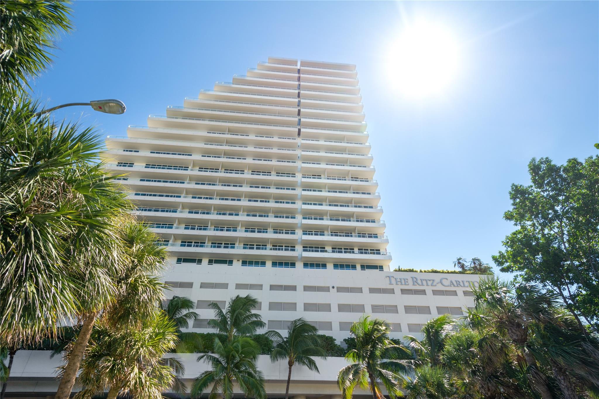 Your incredible opportunity to own a piece of a global luxury hotel brand. Located atop the Five-Diamond Award-Winning Ritz-Carlton a lifestyle for those who appreciate exquisite, richly appointed surroundings with every convenience available at your fingertips with ocean and Intracoastal Views. Enjoy endless views of the Intracoastal and breathtaking sunsets from your private terrace. In addition to having all amenities of the Ritz, including pool, spa, fitness center, concierge, room service and valet parking, the residences are an extraordinary way to live The Ritz lifestyle. Participation in Hotel Rental program is optional and flexible for owner use.