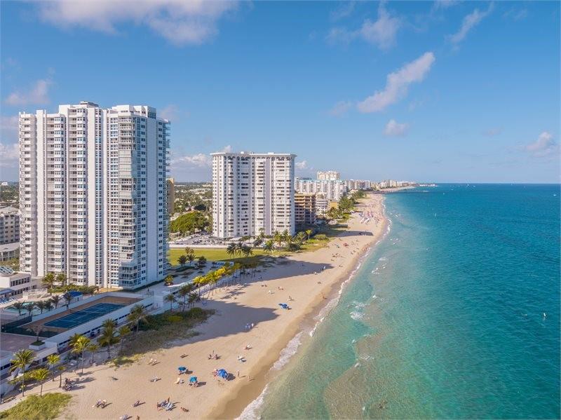 This spacious, beautifully upgraded and tastefully furnished luxury residence with ocean views is a must see. The apartment is located in an amazing beach front residence with private beach access. The unit is beautifully remodeled throughout, and it comes fully furnished (if desired furniture can be removed). The building offers resort level amenities including heated pool and spa (just redone in 2024); fully equipped gym; tennis/pickle ball court, sauna, beachfront barbecue area, billiard and ping pong rooms, card room, library, ballroom and top floor sky lounge with breathtaking views of the beach and the city, where you can entertain your guests. Washer and dryer in the unit. Assigned parking spot is covered. Apartment offers floor-to-ceiling high impact windows.