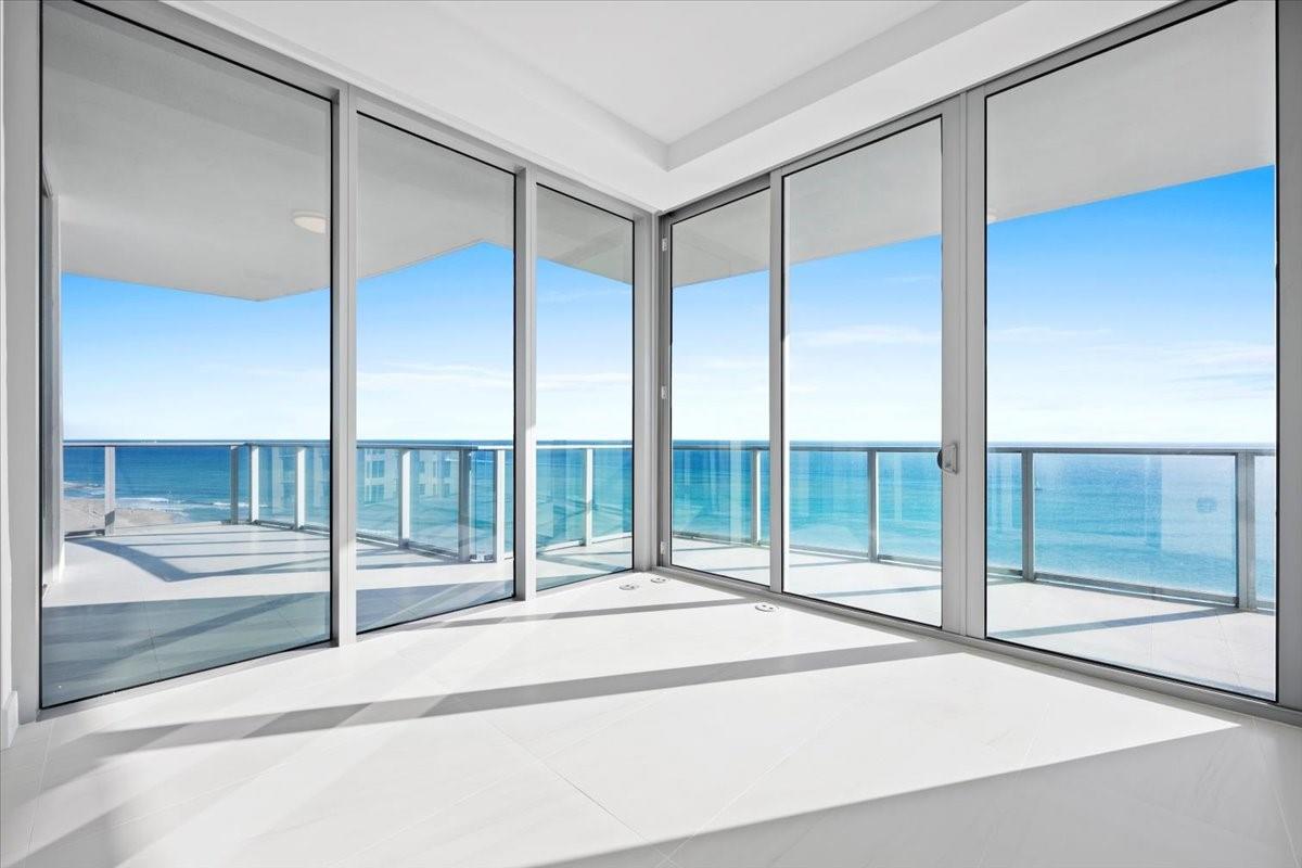 The Amrit Ocean Resort and Residences on Singer Island in the Palm Beaches offers a luxurious oceanfront living experience. The newly developed beachfront property features spectacular sweeping ocean views, floor-to-ceiling glass doors, 10-foot ceilings, a wet bar, and contemporary fixtures and finishes. The units include 2 bedrooms, 2.5 baths, plus a den, and a custom European kitchen. Enjoy daily tranquility from a 590 sq. ft wrap-around balcony with breathtaking ocean views. At your convience sits a 100,000 sq foot state of the art health and wellness facility, two gyms, a yoga terrace, four on-site restaurants, full beach and pool services. A perfect place for those seeking a blend of luxury and wellness. In process of being furnished and will consider a lease purchase. The Amrit Ocean Resort and Residences on Singer Island in the Palm Beaches offers a luxurious oceanfront living experience. This newly developed beachfront property features direct oceanfront residences with spectacular sweeping ocean views, floor-to-ceiling glass doors, 10-foot ceilings, a wet bar, and contemporary fixtures and finishes. The units include 2 bedrooms, 2.5 baths, plus a den, and a custom European kitchen. The en-suite bathrooms boast double sink vanities, imported flooring, quartz stone countertops, custom European cabinets, and soaking tubs.

Residents can enjoy daily tranquility from a 590 sq. ft wrap-around balcony with breathtaking ocean and intracoastal views. The condo provides an unmatched residential experience with a wide array of amenities and services, onsite 100,000 sq foot state of the art health and wellness facility, two gyms, a yoga terrace, four on-site restaurants, and full beach and pool services. A perfect place for those seeking a blend of luxury and wellness.