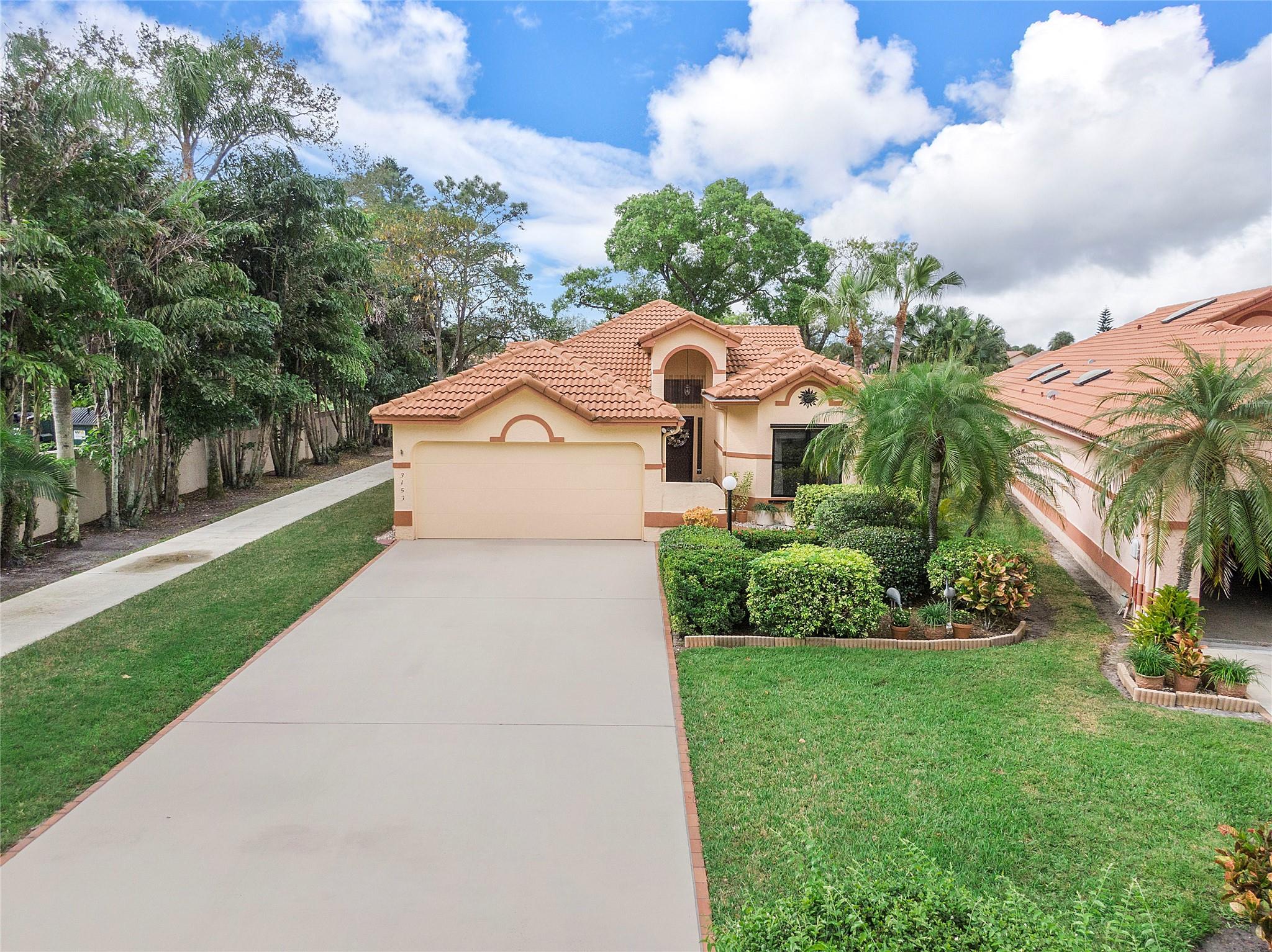 Meticulously maintained, furnished, 2 bed 2 1/2 bath + den pool home on Martin Downs Golf Course. Gated community, no membership required. Enjoy the large screened in pool area with 1/2 bath, outdoor shower & beautiful sunsets. Tile flooring throughout main living areas & laminate flooring in the bedrooms. Den/office can be used as a 3rd bedroom. Large primary bedroom with his & hers closets & walk-in closet. Remodeled primary bathroom boasts huge glass enclosed shower with bench & granite dual vanities (2020). Roof & hot water heater 2018. AC 2015. Eat in kitchen overlooks the golf course & features plenty of storage with recessed lighting. Large formal dining area flows into the family room. Hurricane impact garage door & panels. Great location, close to highways, restaurants & shopping.