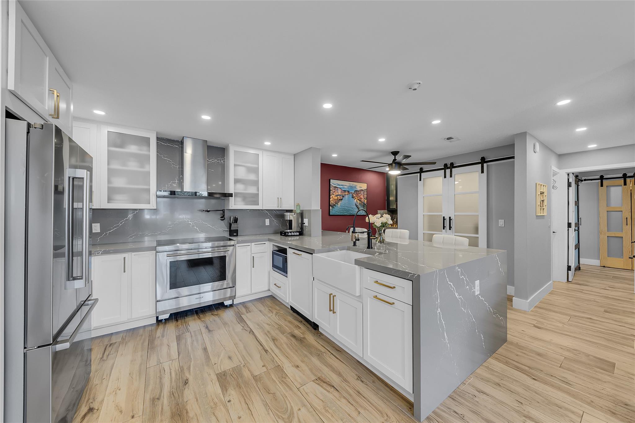 Incredible transformation features a fabulous gourmet kitchen w/oversized island, designed by a professional chef. Wolf induction range, Lintz faucet, instant hot water dispenser, soft-close cabinetry, designer lighting & finishes - a culinary enthusiast’s dream! Spacious layout includes oversized storage under stairs, indoor laundry, 2021 A/C & water htr, and custom electronic blinds. All impact windows for peace of mind. Steps to the ICW pool, bar, & grills, you'll enjoy gathering with friends for socializing or dinner. Stay active w/pickleball, tennis, boating, swimming or walking or enjoy indoor activity in one of 2 fitness centers. Rentable right away, 2x/yr, 3month min. Dockage $3/linear ft. Luxurious living in a fabulous guard-gated, deep water community! Credit requirements apply. Credit and income requirements apply. Must have 700 credit score. Application and interview required for condo approval. Boat dockage $3/linear foot/month plus electric. 50ft. max. Waitlist. Inquire with dockmaster.