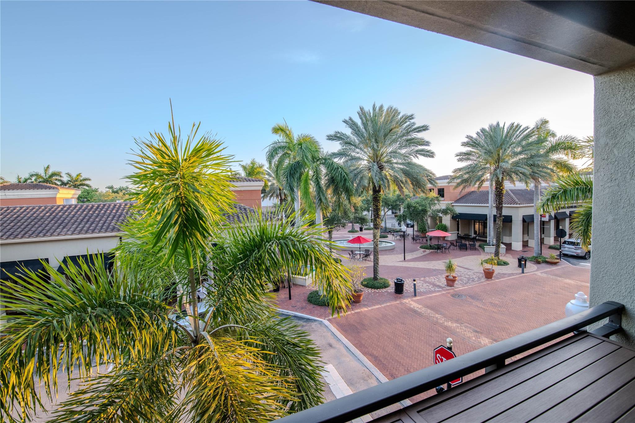Located in the heart of Palm Beach Gardens, this rare and unique second-story condo offers a stunning view of the vibrant town center courtyard like no other, featuring a tranquil fountain, shops, and dining options, all just steps away. The condo features beautifully updated bathrooms and a modern kitchen, complemented by elegant wood and tile flooring throughout. Residents of the sought-after Residences at Midtown community enjoy exclusive access to incredible amenities, making this an ideal place to call home. Whether you're relaxing on your private balcony or exploring the nearby shops and restaurants, this property offers a unique combination of comfort, style, and location. Midtown is located between I-95 and FL Turnpike, and within walking distance to Publix and The Fresh Mkt. Unit is equipped with Reverse Osmosis water filtration system and kitchen features new SS appliances including state of the art induction oven.