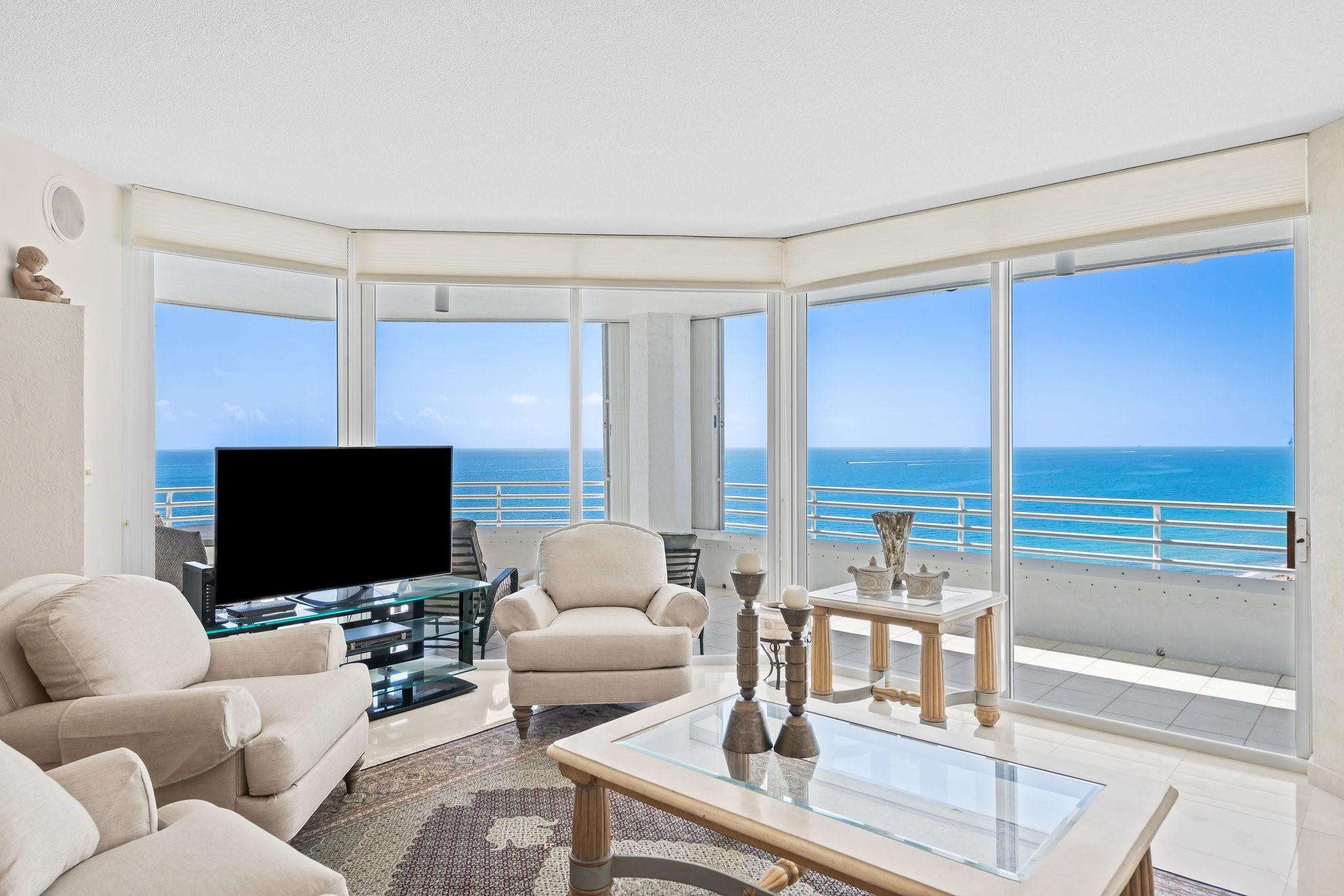 Experience the ultimate Florida lifestyle! This elegant 3-bed, 3 bath oceanfront condo offers 3,000 square feet of luxury living. Enjoy breathtaking direct ocean views and the calming sound of waves from this SE corner unit, with each room opening to a spacious terrace. The primary suite features a private balcony, while the eat-in kitchen and full wet bar are perfect for entertaining. Located in a prestigious 52-unit boutique high-rise, this residence offers amenities: a doorman, gym, resident's lounge, media/recreation room, billiards room, barbecue area, and lush common gardens. Two parking spaces included. Pets are welcome, making this condo a true tropical paradise. Building undergoing window/balcony replacement. Work complete by end of this year. Reserves funded as per SIRS report.