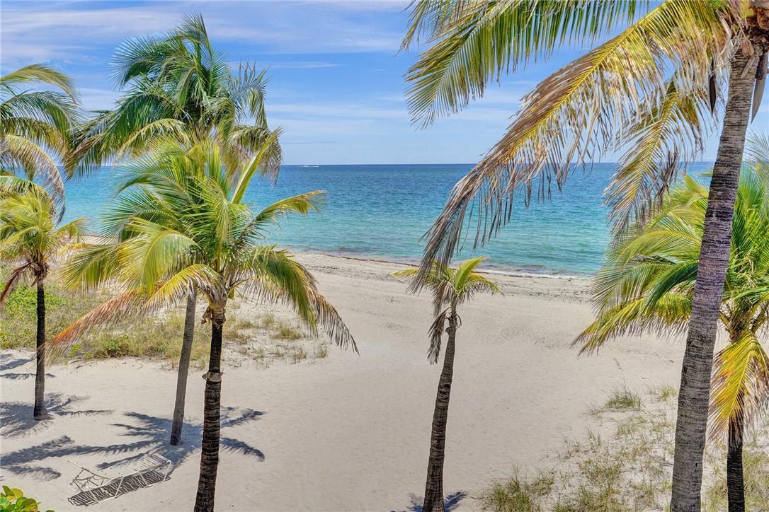 Exquisite 2-bed/2-bath beachfront condo in Pompano Beach with panoramic ocean views. Sunny & light-filled, one-of-a-kind unit with floor-to-ceiling IMPACT windows, an oversized balcony, and an open living space ideal for entertaining. Updated kitchen includes a pantry, breakfast nook, and in-unit washer/dryer. Separate Storage Unit. 
Spacious primary suite with a large walk-in closet and marble-accented ensuite bathroom. New mechanicals in unit. Second bedroom can double as an office with ocean views. Ceramic tile and woodgrain laminate flooring throughout. Resort-style amenities: pool, tennis, pickleball, sauna, covered parking.  Sky Lounge with spectacular panoramic views, kitchen, entertainment area and much more.  Don't let this unbelievable condo pass you by.