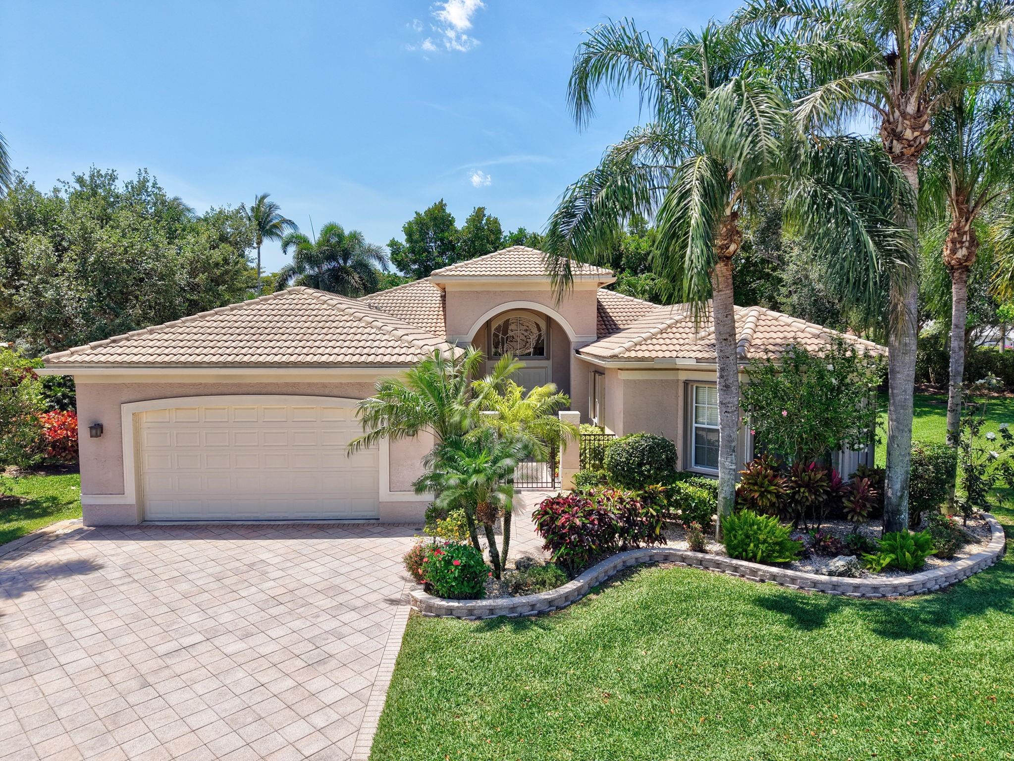 If you love to entertain, this is your dream home! Tucked at the end of a quiet cul-de-sac, this Pamplona model is located in sought-after Valencia Palms—an active 55+community with pools, tennis, pickleball, clubhouse, café, and more built by GL Homes. This home features an impressive bar, custom office/bedroom with two Murphy beds for guests, and a cozy den perfect for movie nights.  Another, light-filled, guest bedroom is at the end of the hall.  The  enormous, primary suite includes, space for a desk, sitting area, two walk-in closets, soaking tub, and separate shower. Outdoors, enjoy a resurfaced pool with heater, extended 10’ paver patio for dining and grilling. A whole-house generator ensures the fun never stops—even in a storm! Designed well. Perfectly maintained.