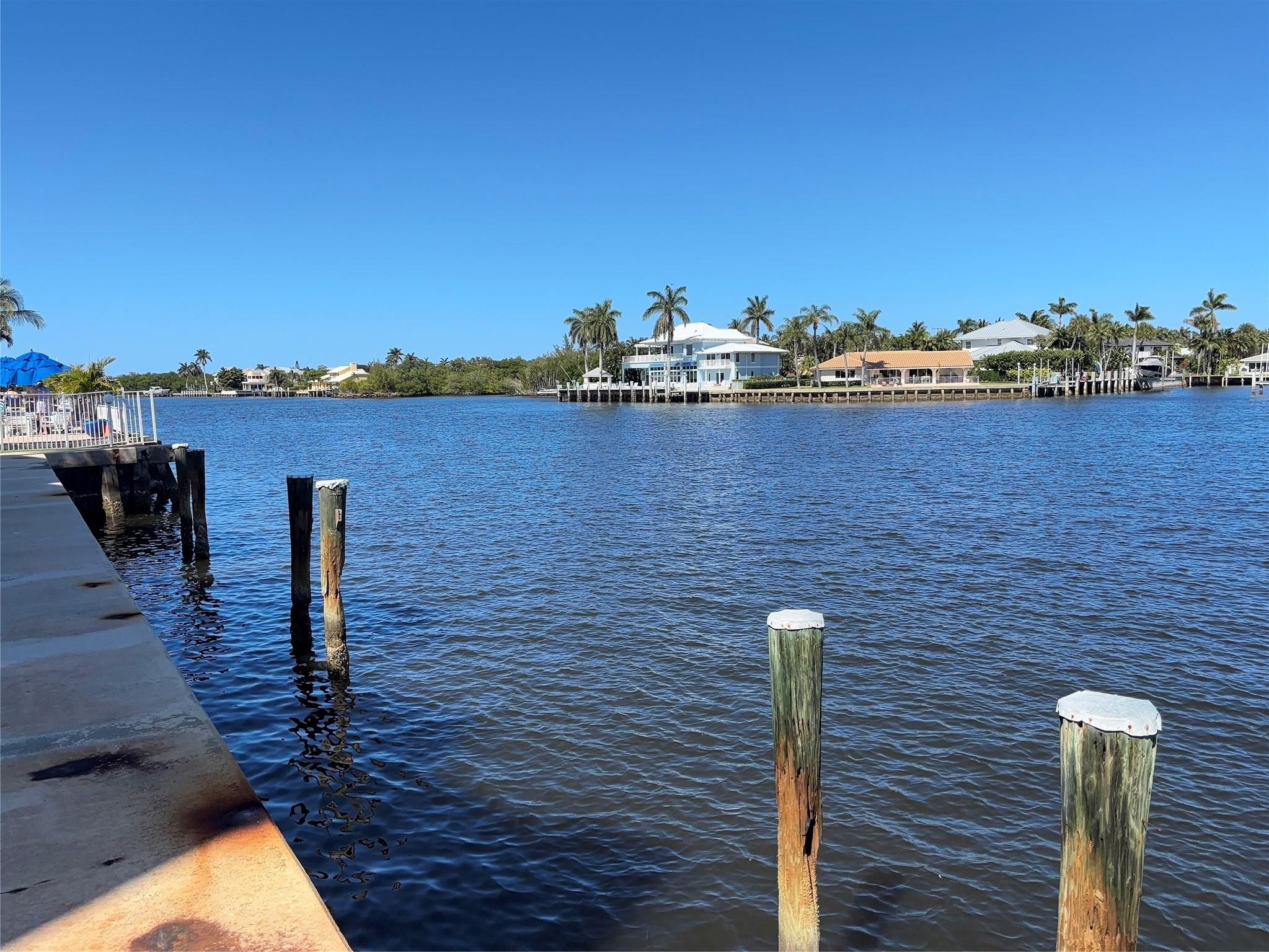 Did you ever imagine that you could live directly on the intracoastal with a billionaires view? This is your chance. Come and see this lovely home today.  This corner unit is very spacious and open with unbelievable views. Imagine sitting on the porch with your morning coffee just watching the mega yachts go by.  The unit is furnished and updated for maximum comfort and functionality.  There is a new air conditioner unit, so no need to worry about keeping cool. Want to swim in the winter? No problem with your heated pool on the intracoastal! The unit has hurricane impact windows and doors so no need to worry about storms. All assessments are paid.  Just grab your toothbrush and move in! Or bring as much as you want, there’s not just one, but two walk in closets. Lots to love with this one!