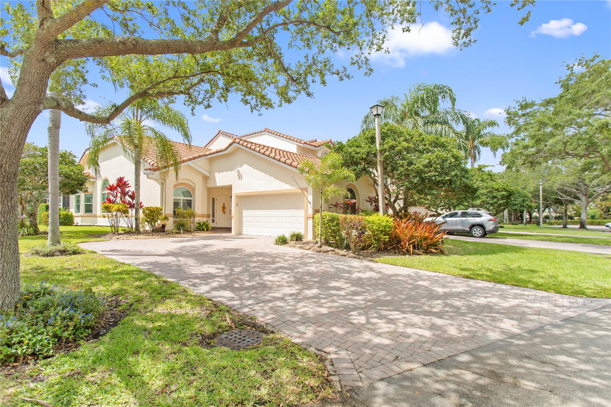 Very rarely available corner villa overlooking a canal and the Oaks golf course.  Beautifully renovated and maintained with too many extras to mention.
All impact windows and sliders, new air conditioner, water heater, pool heater and pump.
Conveniently located in close proximity to the beaches, world class dining, entertainment and shopping as well as many golf courses, tennis and pickleball courts and parks. Steps from the new Pomp Complex that includes Top Golf and a casino.
Make it your own oasis for a comfortable year round residence or come and join us for the exciting South Florida escape from the cold winters.