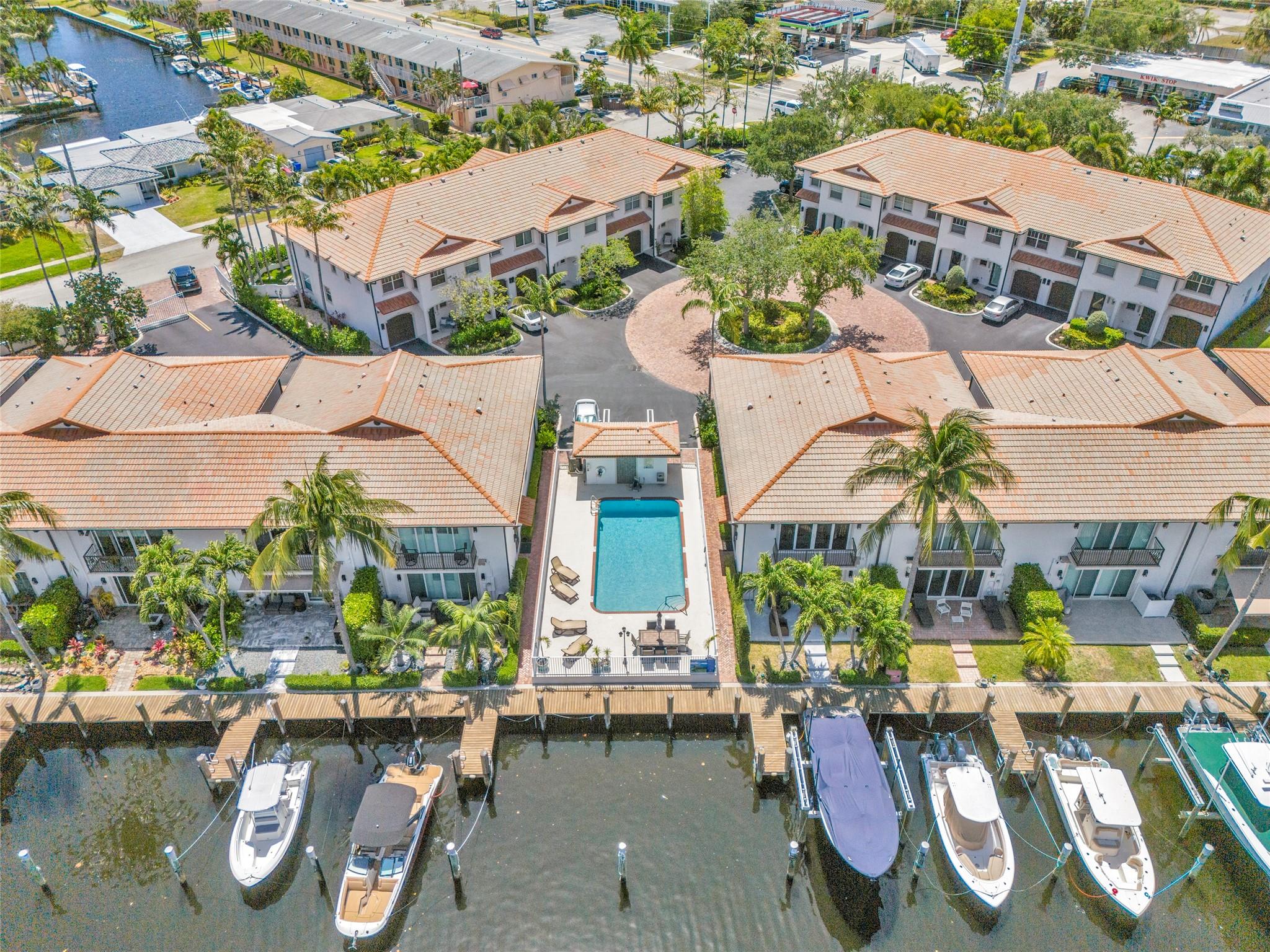 Located in the boutique waterfront community of Cypress Bay Estates, this 3 bed, 2.1 bath townhome offers ocean access with one of the largest boat slips in the community. The dock is equipped with water, electric, and boat slips are permitted. Features include impact windows and doors throughout, open floor plan, hardwood floors, granite countertops, and a recently updated patio. Bedrooms have like-new carpet, and the primary bath features a renovated shower. Includes a 1-car garage with motorcycle lift and driveway parking space. Pet-friendly community with new landscaping, fresh paint, heated community pool, and HOA reserves.