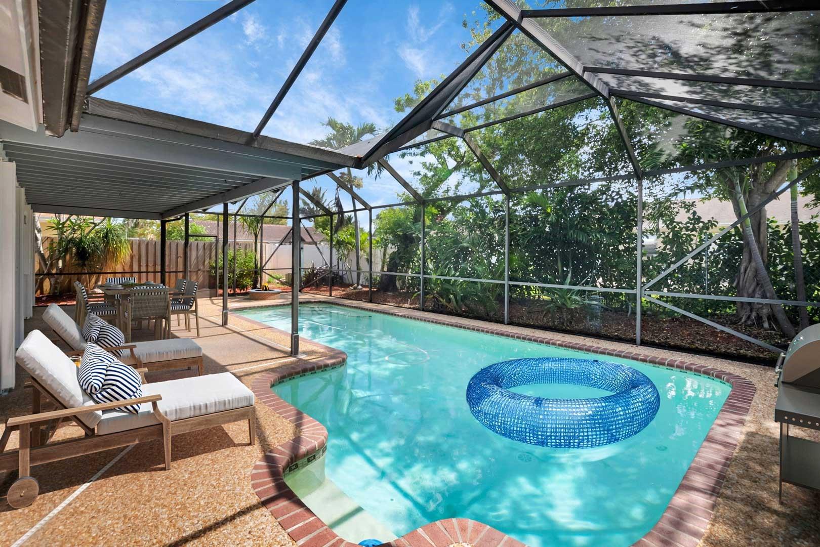 Spacious 3/2 POOL home in Sandalfoot Cove w/ NO HOA. Large LR w/ 18” tile floors + crown molding – perfect for movie night. DR boasts room for meals. Entertaining is a breeze in your wide-open kitchen featuring a NEW, Samsung S/S fridge & Whirlpool range. Ample cabinets. Savor morning coffee in the bright breakfast nook overlooking the pool. Fall in love w/ corner primary BR w/ NEW LUXURY vinyl plank floors adorned w/ 6” baseboards. Newer bath w/ a BIG walk-in shower w/ pretty mosaic inlays. Corner BR 2 has luxury vinyl plank floors. Bath 2 has a tub for guests to sip a cool drink. BR 3 is in the converted garage. Laundry w/ newer pedestal W & D. Relax w/ friends on your covered  patio. Take a dip in the sparkling screened pool! BRAND NEW A/C SYSTEM!!! 1 car garage. FULL ACCORDIAN SHUTTERS