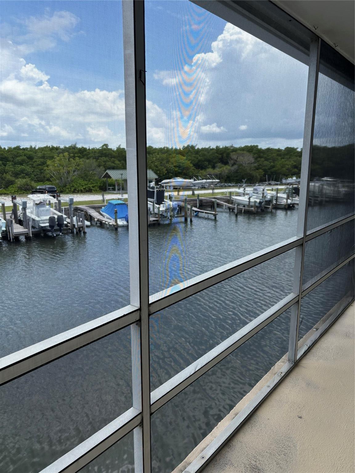 Beautiful St. Lucie Riverfront condo on Hutchinson Island in Jensen Beach. RARE - COMES WITH DEEDED DOCK. Dock is double wide & NEW pilings, electric and lift. 20,000lb capacity. Fits 10.9 W x 31 L boat. Must see top floor newly renovated condo! Sunset views from balcony, living room, primary bedroom and Kitchen. Sunrise views from kitchen & 2nd bedroom. Room for King size bed in Primary. All electric, plumbing, bathrooms, ceilings, walls, doors, flooring, kitchen have been renovated and are brand new. Luxury leather granite counter tops, Quartz kitchen sink, Italian stove, soft close cabinetry, Washer/Dryer & more. Come spend time playing in the Ocean at your deeded beach & tiki hut. Close to restaurants, shopping & beaches. Pet allowed with dedicated, fenced dog park. Photos coming soon!