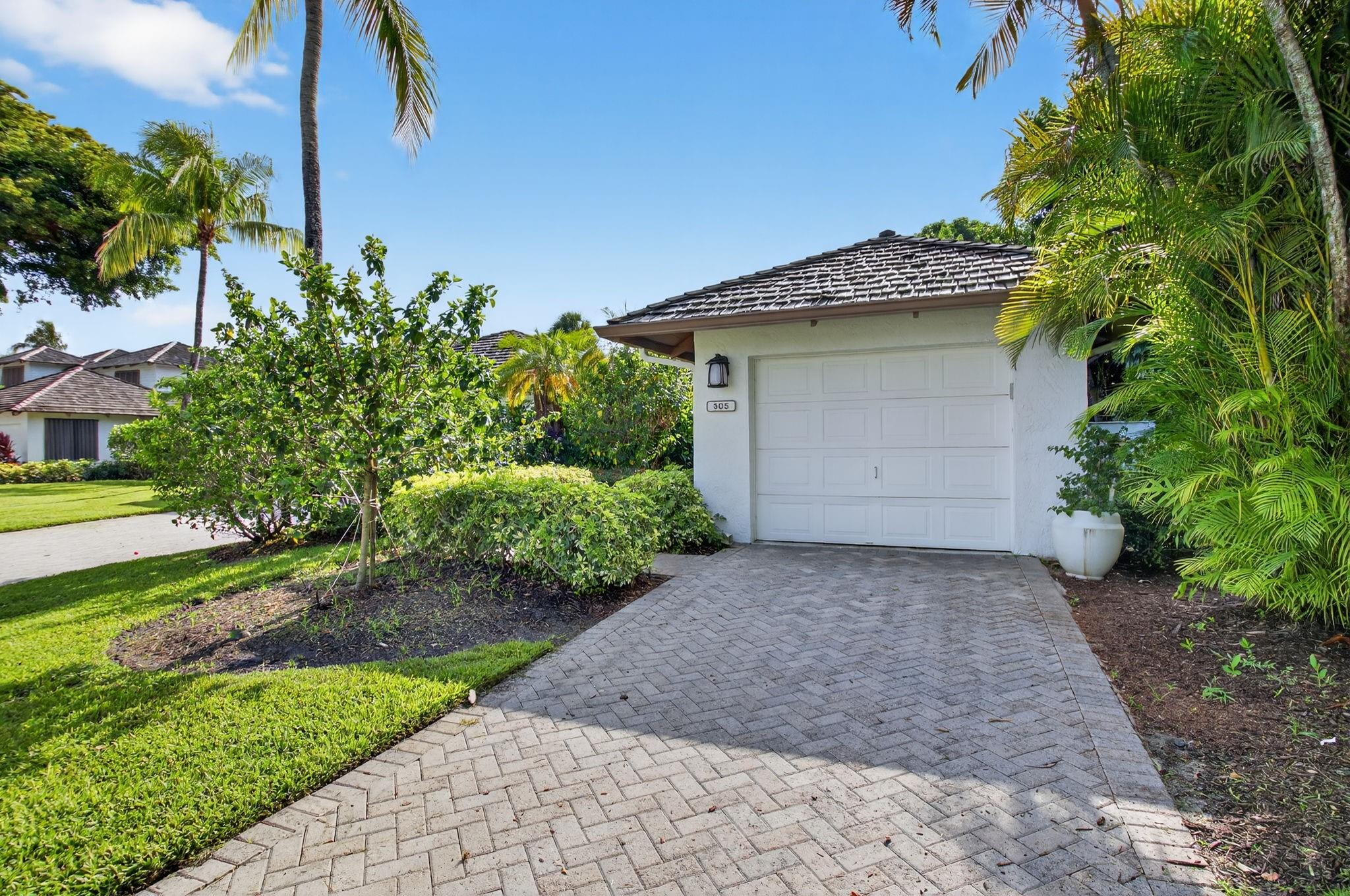 Welcome to this beautifully maintained and thoughtfully renovated villa in the highly desirable Waters Reach section of Boca West Country Club. This stunning 2 bedroom 2 bath home is the epitome of style, comfort and smart design.
The spacious modern eat in kitchen boasts sleek, contemporary finishes  and offers an inviting space for both everyday living and entertaining. Every detail in the home has been carefully considered. The master bedroom and bathroom reflect a blend of luxury and functionality. Enjoy lush serene garden views from the patio with the golf course just beyond. Perfect for relaxation! This is more than just a home, its a lifestyle. A must see villa in one of Boca Ratons most prestigious communities.