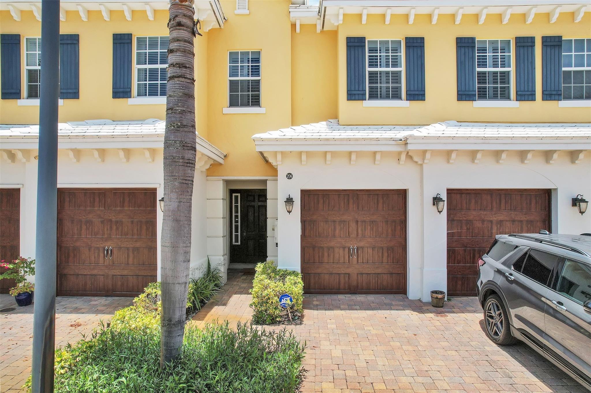 Elegant and generously sized townhome located in the quiet, well-kept community of Mariner Court. This beautifully maintained 3-bedroom, 3.5-bath plus 2 TV room and Private Heated Pool!! residence is perfect for families. Offering over 2,500 square feet of living space Featuring impact-resistant windows and doors throughout, an open-concept kitchen with granite counters and stainless steel appliances, and a spacious owner’s suite with bay window seating and dual walk-in closets. Rich hardwood flooring adds warmth to the upper level, complemented by plantation shutters throughout. You’ll love the ample storage space, and lushly landscaped backyard. Includes a 2-car garage. Just minutes from the Intracoastal, great schools, dining, and shopping.