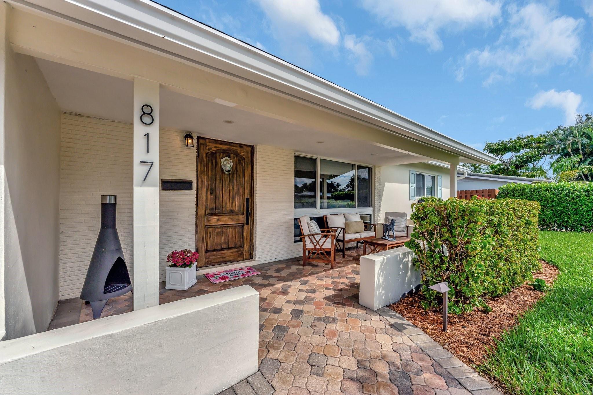 Sensational TOTALLY UPDATED, POOL home featuring 3 Bedrooms 1.5 Baths & Tiki Hut! TROPICAL, EXOTIC, LUSH RESORT OASIS PROFESSIONALY LANDSCAPED! NO HOA! Gorgeous, consistent neutral floors. Smooth finished ceilings. ALL IMPACT GLASS! LR w/ an accent wall w/built in shelves. Entertaining is a breeze in your UPDATED kitchen - S/S appliances, farmhouse sink & 42" cabinets. Large FR - ready for movie night. Fall in love in the corner primary BR boasting NEW luxury vinyl plank floors & closet buildouts. UPGRADED primary bath w/ frameless shower. Big guest BRs. Powder room has a marble top counter height vanity. Take a dip in the sparkling NEW HEATED SALTWATER POOL. NEW thatched Tiki hut w/ electric for parties! Inside laundry w/ W/D. Hurricane rated, insulated storage shed w/ split A/C included.