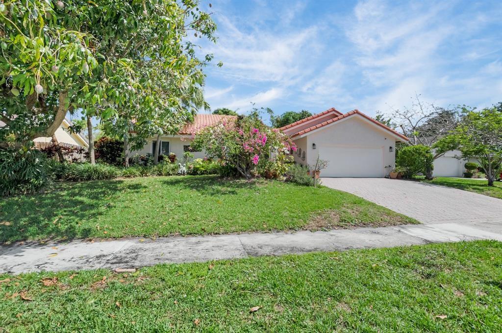 Priced to sell is this beautiful 3 bedroom and 2 bath in Timbercreek community. Low HOA in a 2238 sq. feet under air, step through the impact resistant front door onto a tiled entryway that leads you to the living area. On your left, the kitchen and dining area. Secured with impact windows, doors and garage, offering enhanced security and peace of mind. A tropical landscape of fruit trees: mango trees, jackfruit, spanish plum, guanabana, carambola, bay leaves. Bathrooms have been upgraded, interiors freshly painted, and most furnitures are between 2 to 8 years old.