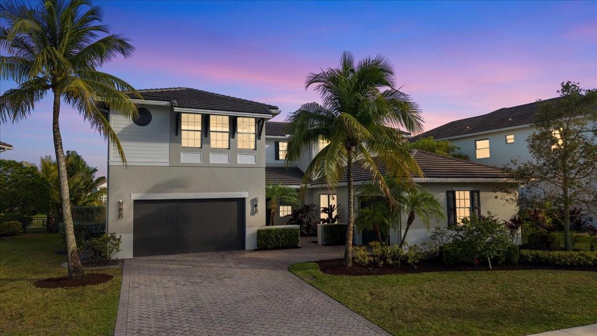 Stunning fully remodeled 5BD/4.5BA home in prestigious Heron Bay, Parkland! Featuring an open-concept layout with soaring ceilings, a sleek white kitchen, new floors, and designer bathrooms. One bedroom plus 1.5 baths and a private gym are downstairs; upstairs offers a spacious primary suite, 3 additional bedrooms, and 3 full baths. Enjoy tranquil lake views, impact windows, natural gas, and a 3-car garage. Plenty of room to add your dream pool! Heron Bay offers resort-style amenities including pools, clubhouse, tennis, and more!
