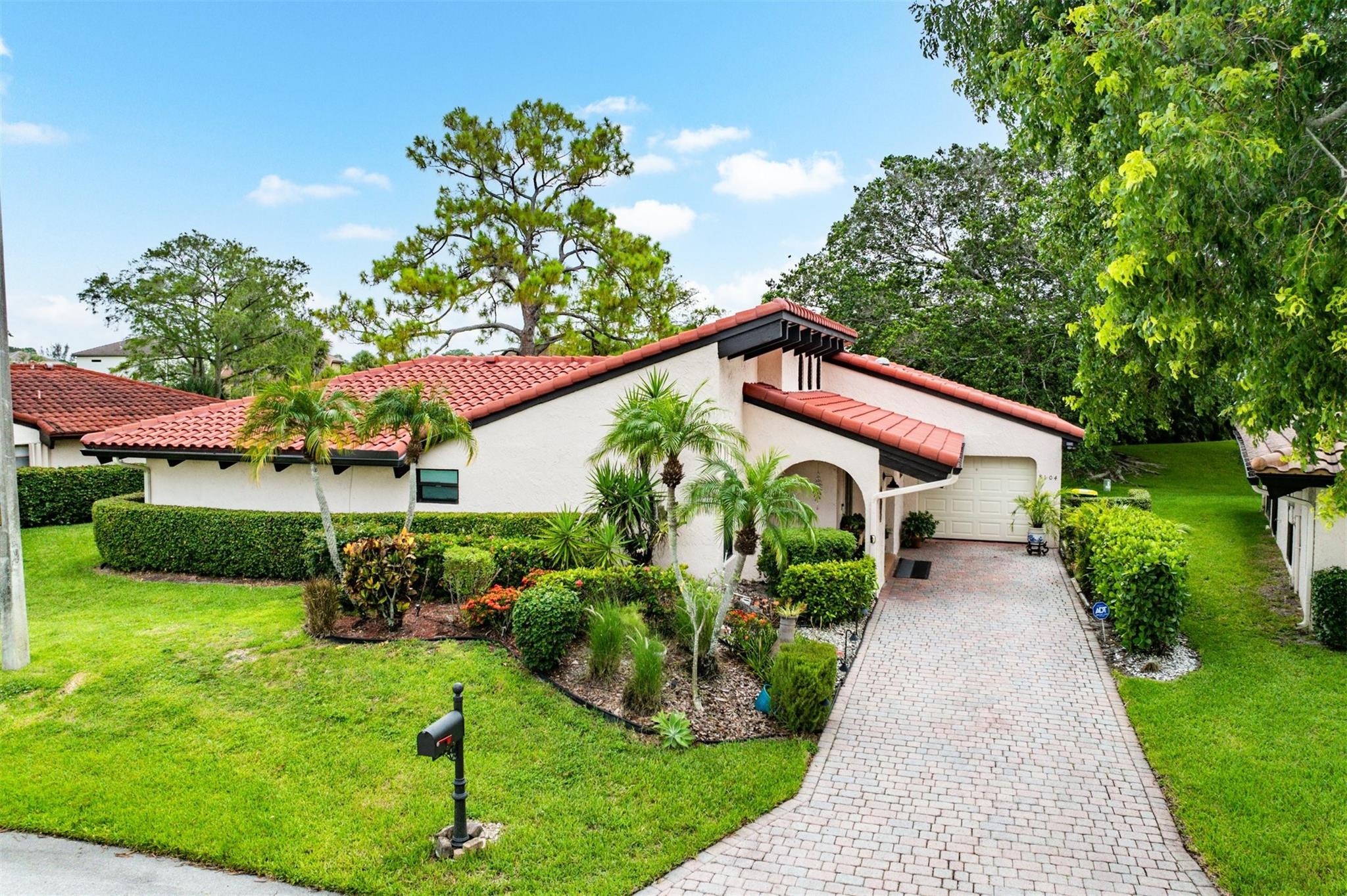 This impeccably remodeled 3 bdr residence is a true standout In Pines 11! Designed w/ sophistication & comfort! Enter this opulent home & take note of high-end finishes. Luxury vinyl & tiled flooring, vaulted ceilings, clerestory windows, an open airy floor plan that flows seamlessly into an expansive 20x20 sunroom offering unobstructed GOLF COURSE VIEWS! Chef's kitchen is a show stopper w/ ss appliances, designer cabinetry, under cabinet lighting & a convenient pass through to the sunroom! Retreat to your spa-inspired primary suite & bath. The 2nd bath rivals the 1st w/ it's sleek, upscale finishes worthy of a lux hotel! Dine Al Fresco & enjoy the patio golf views! Newer roof, AC & IMPACT WINDOWS! Sparkling community pool, pet friendly & low HOA. w/ access to top tier golf and dining.