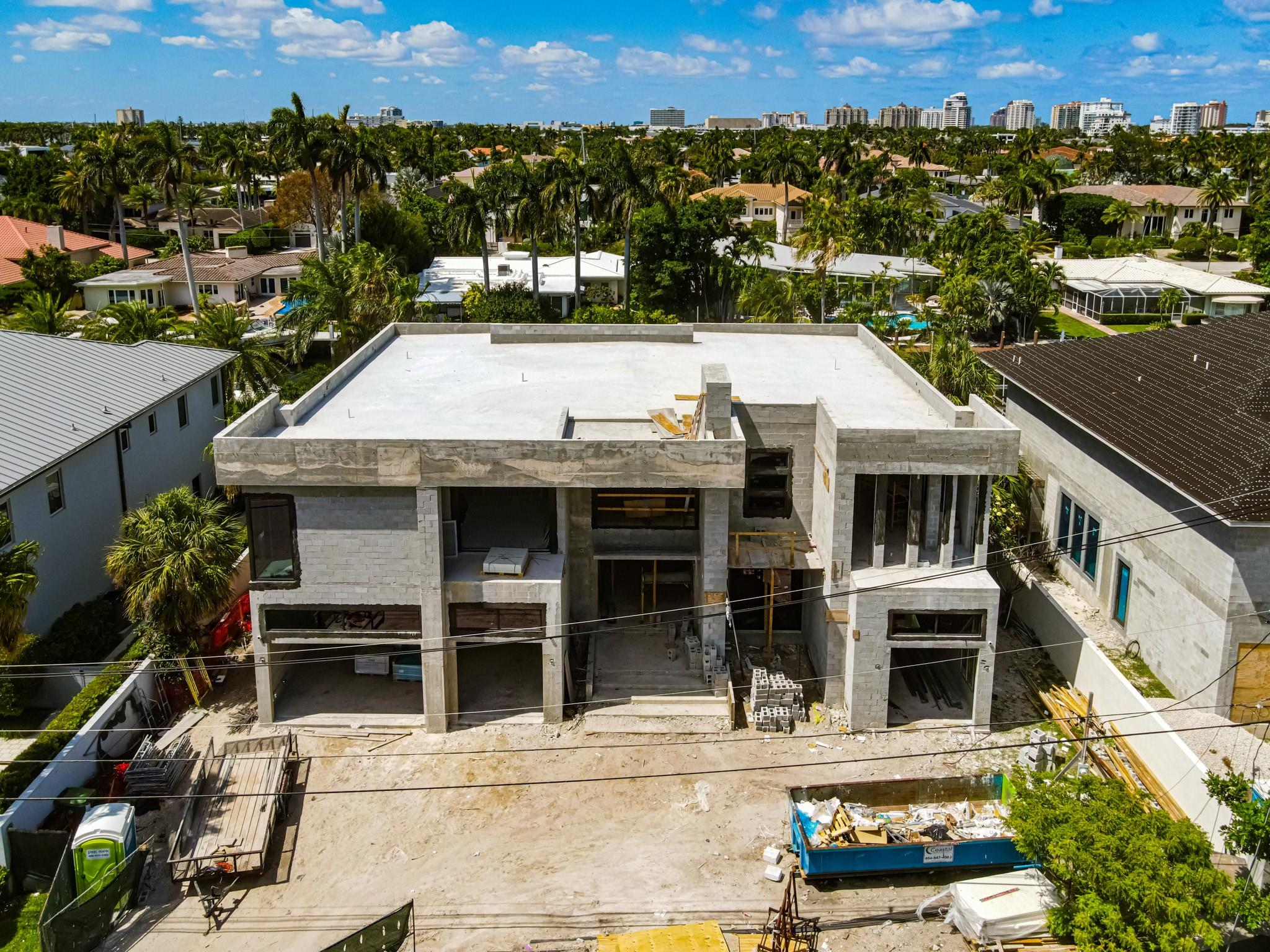 This striking new-construction architect-designed Modern-style waterfront residence near Las Olas is introduced by the grand clear-story entry, with a striking metal-and-glass stairway and a ‘wow-factor’ clear acrylic-sided elevator. Huge windows and doors throughout offer amazing water views, and with 100-feet +/- on the water and a dock, boaters are granted easy access to the Atlantic.

COMPLETION EXPECTED in 6-7 months.  Interior drywall being installed now.  Custom cabinets, Control 4 system for Electric and Audio Visual.  Amazing custom finishes and priced to sell.  Buy NOW and pick your colors.

Please see the Supplement Remarks section for full description.  Plan subject to change.  Please verify final plans and specs. An elegant cosmopolitan ambience is achieved in this spectacular Modern-style seven-bedroom masterpiece, with 8,999 +/- total square feet. Astutely designed by Michael Sher of Symcon Development / Logic Builders Inc, this new-construction residence will be ready for occupancy in 2024. Creating an immediate impactful allure, the grand clear-story entry, which incorporates a striking metal-and-glass stairway and a ‘wow-factor’ clear-acrylic-sided commercial elevator, flows into the open-floor-plan main living areas. These include a great room, dining area, and morning room, all organized around the gourmet kitchen, a convenient layout for easy service when entertaining. Beautifully conceived details throughout include huge impact-glass doors and windows offering spectacular water views, high ceiling heights, and large-format porcelain tile flooring. The center-island kitchen, sure to satisfy the chef, is finished with sleek European-style cabinetry, white-quartz counters and backsplash and stainless-steel professional-grade appliances. A second island/breakfast bar is especially useful, as it can accommodate pull-up seating for five for informal dining. All about water views, the main living areas and the VIP guest bedroom suite access the pool patio area. Additional rooms downstairs include a library/den, cabana bath, laundry, staff bedroom suite and a glass-enclosed temperature-controlled wine room. Upstairs the primary suite, three guest suites, and media/ guest bedroom are arranged around a family-entertainment salon, which opens to a water-view balcony. The primary bedroom and a guest suite also open to pool-view balcony and a guest suite accesses a garden-view balcony. The spacious primary suite, which presides over half of the second-floor, comprises two huge walk-in closets, an expansive spa-inspired bathroom and an exercise studio. Completing this luxe residence are two attached garages, and high-end amenities include recessed LED lighting, four-zone HVAC systems, pre-wiring for speakers, salt-water and chlorination pool systems, and a concrete roof.



DISCLAIMER: Information published or otherwise provided by the listing company and its representatives including but not limited to prices, measurements, square footages, lot sizes, calculations, statistics, and videos are deemed reliable but are not guaranteed and are subject to errors, omissions or changes without notice. All such information should be independently verified by any prospective purchaser or seller. Parties should perform their own due diligence to verify such information prior to a sale or listing. Listing company expressly disclaims any warranty or representation regarding such information. Prices published are either list price, sold price, and/or last asking price. The listing company participates in the Multiple Listing Service and IDX. The properties published as listed and sold are not necessarily exclusive to listing company and may be listed or have sold with other members of the Multiple Listing Service. Transactions where listing company represented both buyers and sellers are calculated as two sales. The listing company’s marketplace is all of the following: Fort Lauderdale, Deerfield Beach, Hillsboro Beach, Hillsboro Shores, East Pompano Beach, Lighthouse Point, Sea Ranch Lakes Vero Beach, Town of Orchid, Indian River Shores, Town of Palm Beach, West Palm Beach, Manalapan Beach, Point Manalapan, Hypoluxo Island, Ocean Ridge, Gulf Stream, Delray Beach, Highland Beach, and Boca Raton. Cooperating brokers are advised that in the event of a Buyer default, no financial compensation will be paid to a cooperating Broker on the Deposits retained by the Seller. No financial compensation will be paid to any cooperating broker until title passes or upon actual commencement of a lease. Some affiliations may not be applicable to certain geographic areas. If your property is currently listed with another broker, please disregard any solicitation for services. Copyright 2022 by the listing company. All Rights Reserved.