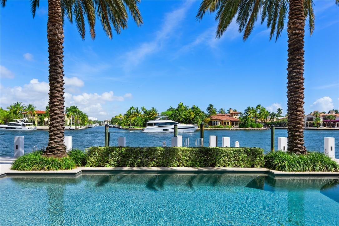Beauty, elegance, quality, location and sophistication. This beautiful custom built residence is located on +/-  101ft of waterfront with direct ocean access on tree lined 7th street in Rio Vista, one of the premier Fort Lauderdale neighborhoods. Built with quality in mind by Bomar Builders in 2010, the craftsmanship in this 4BR + Gym | 4.2 Bath | 3 Car home is evident throughout the home. Vaulted wood beamed ceilings, custom finishes, sophisticated wood molding and  cabinetry, stone floors, temperature controlled wine room, elevator and automated Armor Screen are a few of the custom finishes. This residence is also available for rent. Please call the listing agent.

Update alarm system and camera. 

Automated armor screen from and back