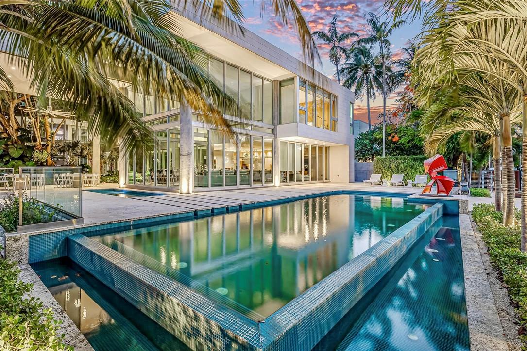 Modern custom masterpiece, on large, spectacular New River waterfront estate. 
On beautiful, prestigious, tree-lined Rio Vista Blvd., 120' of deep water dockage on enchanting New River, designed to maximize changing river views & seamlessly blend with tropical gardens & stately live-oaks. 
Grand entry door opens to foyer of glass & spacious home office & lounge, brings tropical gardens inside. 
Gourmet kitchen opens to spacious family & living rooms overlooking pool & water. 
All weather entertaining in large covered outdoor lounge &
kitchen & expansive private lawn & garden. 
Steps from elevator, master suite has panoramic views & spa-like bath. 
Garage has height for lifts & space to add more bays. 
Yacht Club short golf cart ride & an evening on Las Olas less than 5 minutes.